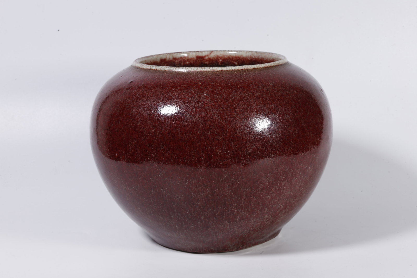 A RED-GLAZED JAR - 3