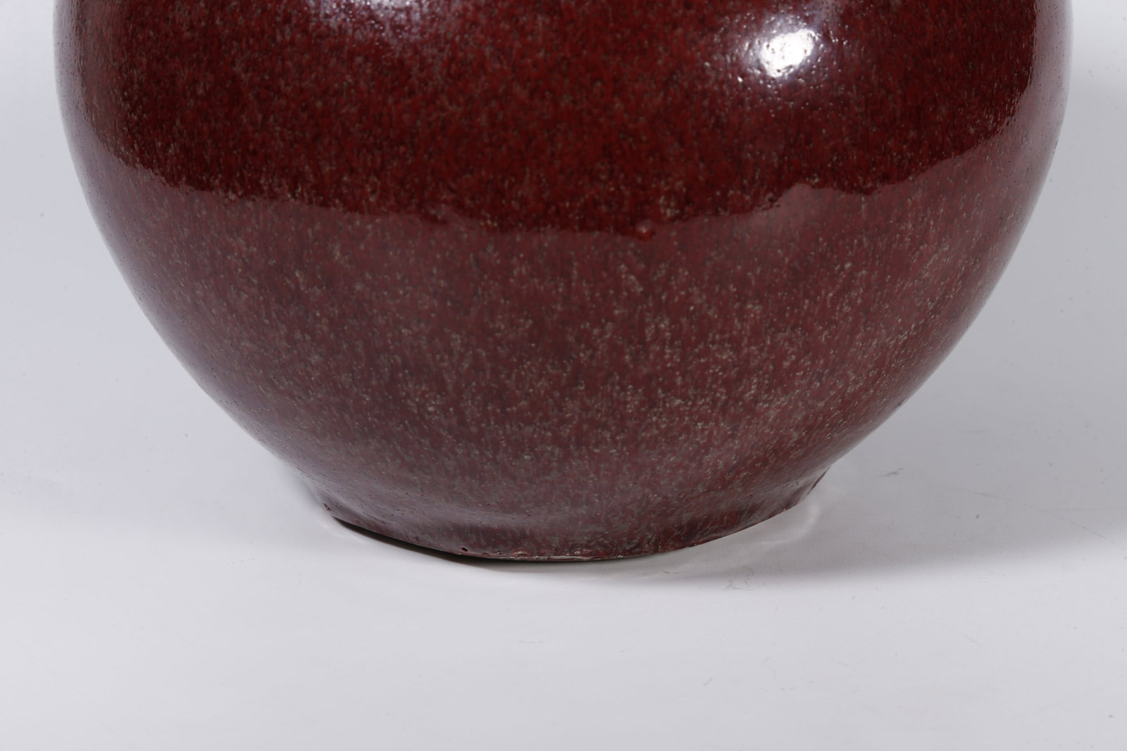 A RED-GLAZED JAR - 6