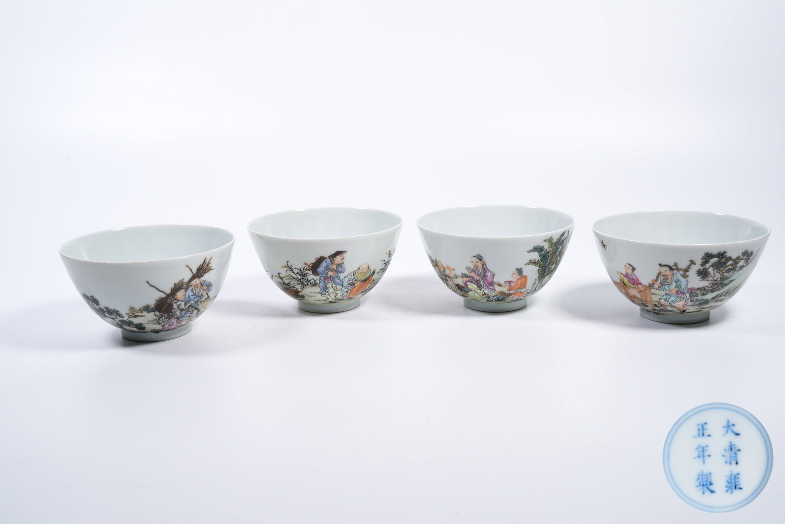 A SET OF FAMILLE ROSE CUPS WITH NARRATIVE FIGURE MOTIFS (1 of 8)