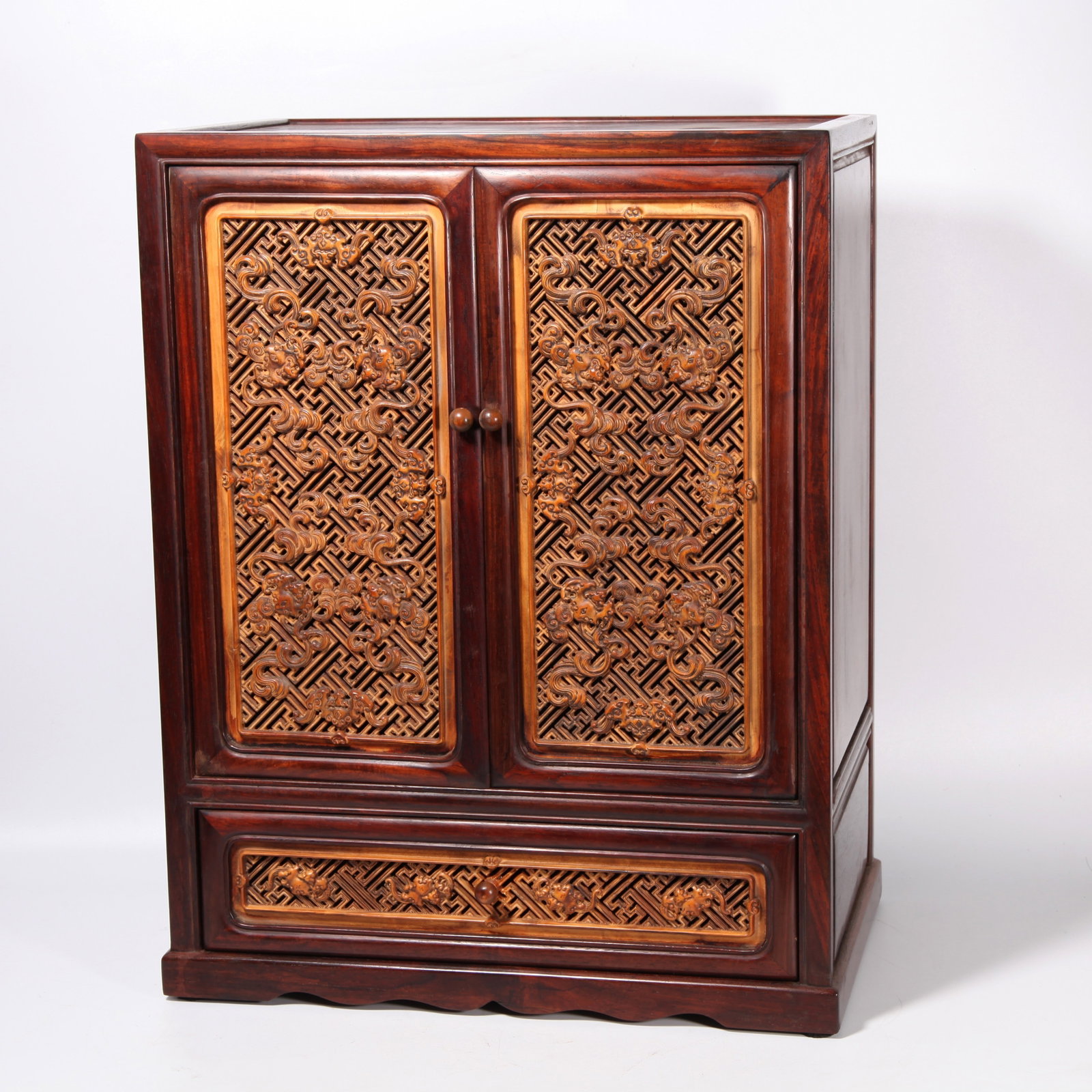 A HUANGHUALI WOOD SMALL CABINET INLAID WITH BOXWOOD CARVED WITH FORTUNE?CLOUD PATTERN (1 of 10)