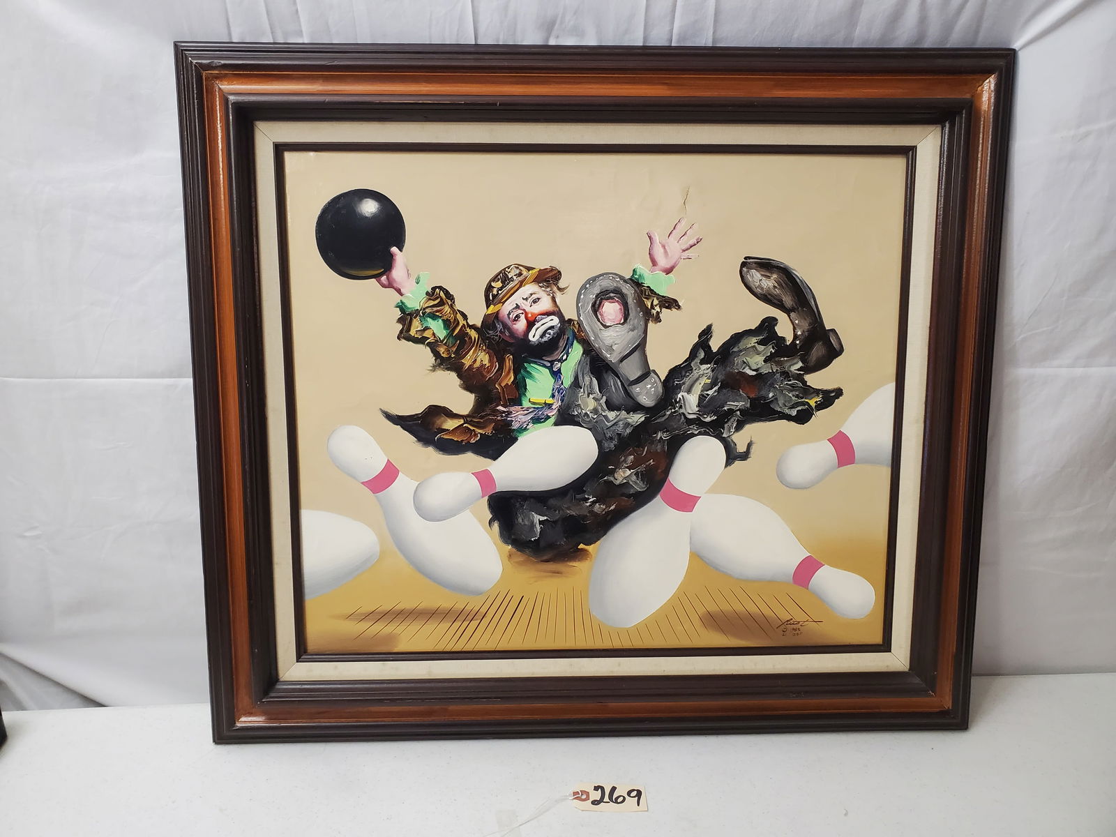 BOWLING CANVAS PAINTING -SIGNED, RUST 1985 21/250: SHOWING GREAT DETAIL, SLIGHT TEAR IN CANVAS AS SEEN IN PHOTOS, WOODEN FRAME SHOWING SMALL SCRATCHES AROUND EDGES. MEASURING 32" WIDE AND 28" HIGH