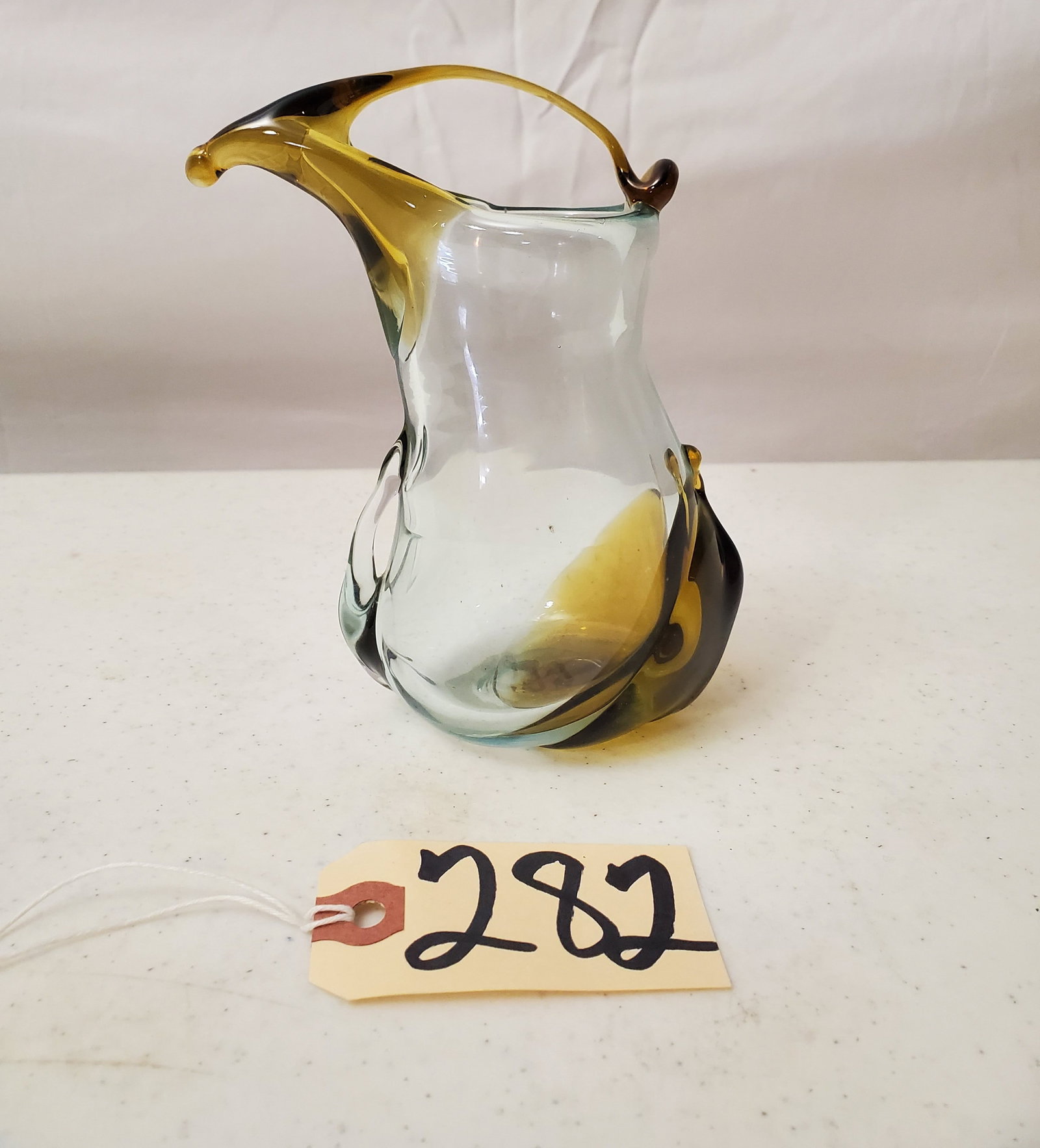 MURANO HAND BLOWN "PURSE STYLE" AMBER VASE, ARTIST SIGNED: DISPLAYS A VERY UNIQUE PULLED HANDLE VASE, 6" HIGH, 4"X 2"