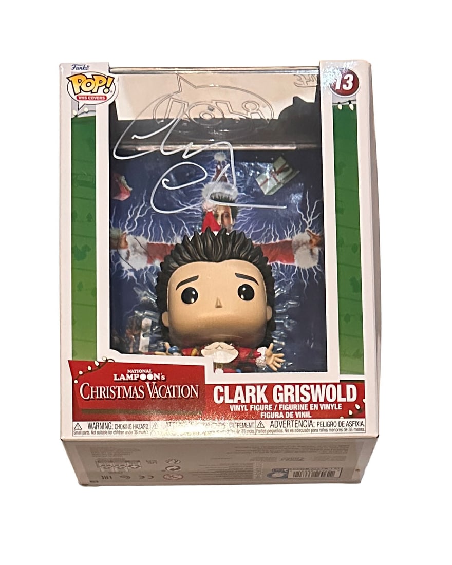Chevy Chase Autographed Clark Funko JSA: Christmas Vacation Large Funko Signed in white paint pen on the from JSA COA no card. Just the sticker on the item.