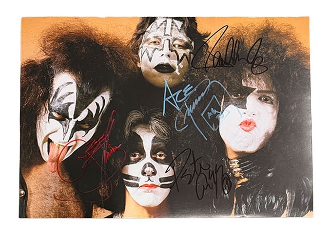 11x17 Kiss Autographed Small Poster: 11X17 Magazine Poster signed by the OG Kiss Line up of the Starchild,The Demon,The Cat and The Spaceman.
