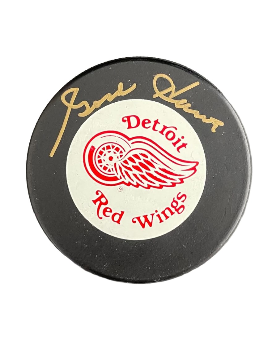 Gordie Howe Autographed Red Wings Puck: Hockey Legend signed in Gold Hockey Puck.