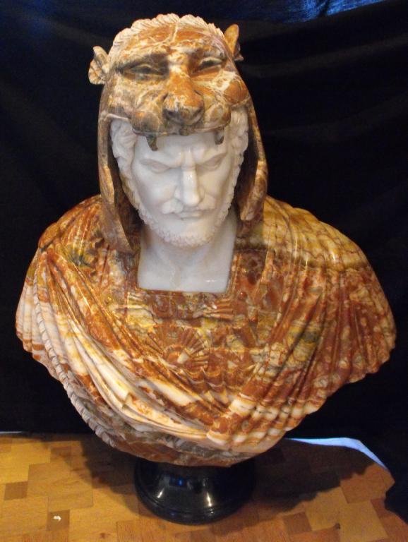 STUNNING LARGE MARBLE BUST OF SOLDIER: A FABULOUSLY DETAILED CARVED MULTI COLOR MARBLE BUST. ROMAN ERA SOLDIER HAS FINE LION HEAD GEAR, HAND CARVED 24 X 40. VERY HEAVY ITEM ( APPROX. 500 LBS) FROM LOCAL LA JOLLA ESTATE