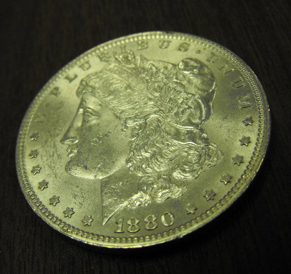 1880 Philadelphia Morgan Silver Dollar: A true AU coin, based upon ANACS grading standards-