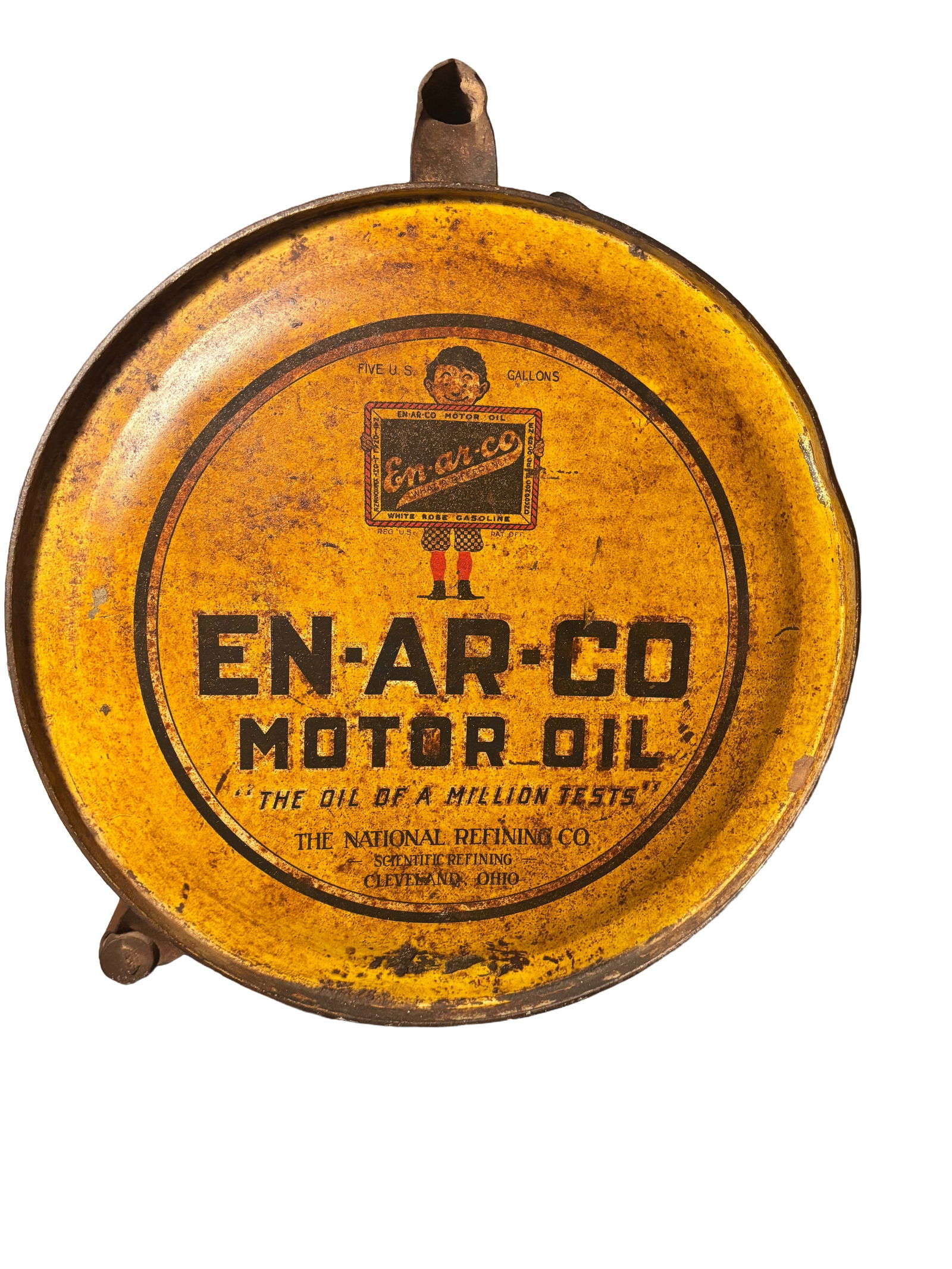 1930s En-Ar-Co Motor Co.5 gallon rocker can: 1930s En-Ar-Co Motor Co.5 gallon rocker can. The can features the iconic En-Ar-Co Boy holding a slate. which was a hallmark of the brands advertising. the can also bears the companies well known