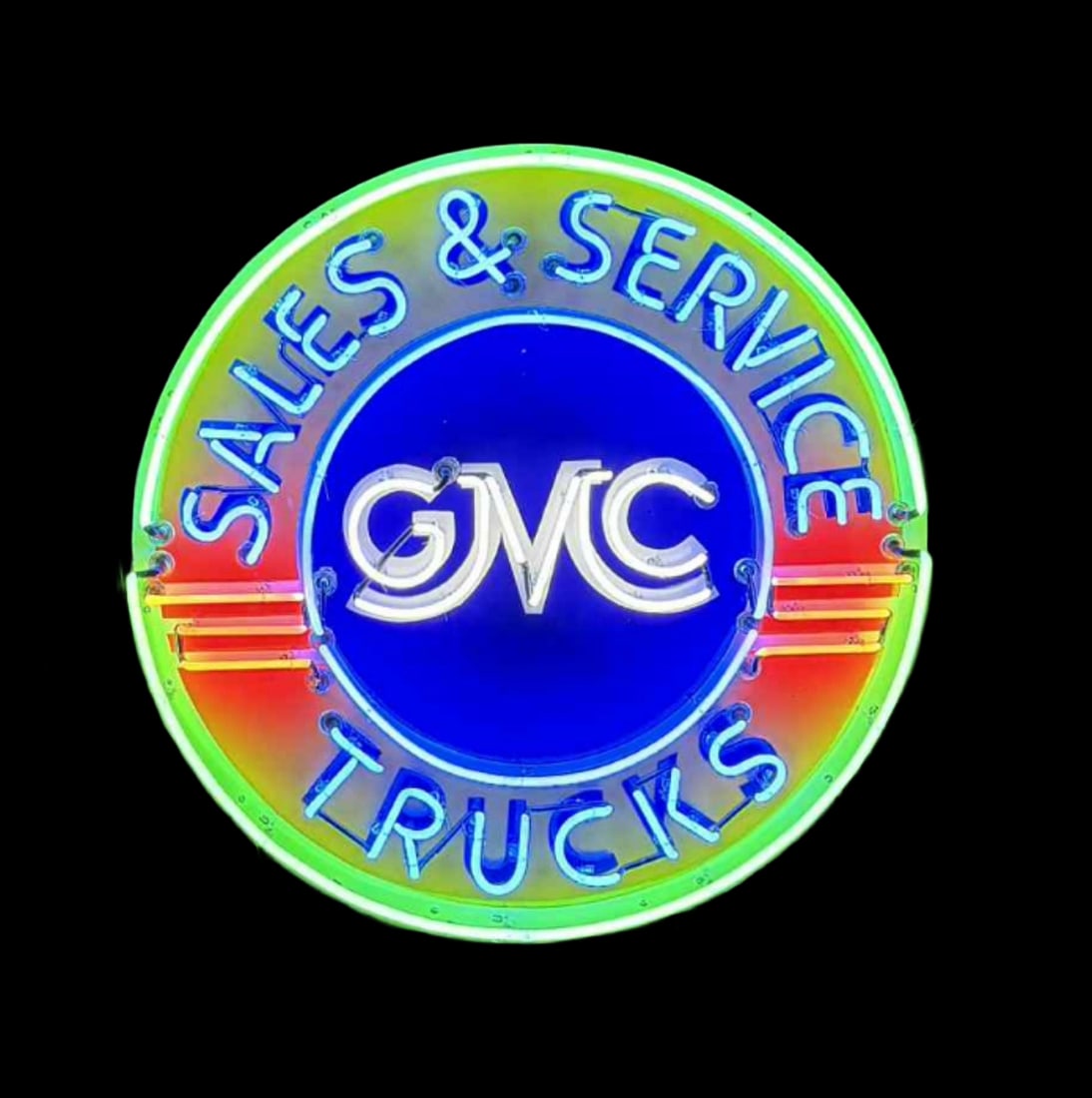 48' GMC Trucks Sales & Service Contemporary Porcelain Real Neon Sign 4 Colors: 48” x 9"deep. GMC Trucks Sales & Service porcelain neon sign. Vibrant 4 color neon. Sign is all new. This sign has 2 new Transformers running it. Everything from the porcelain to the can is done