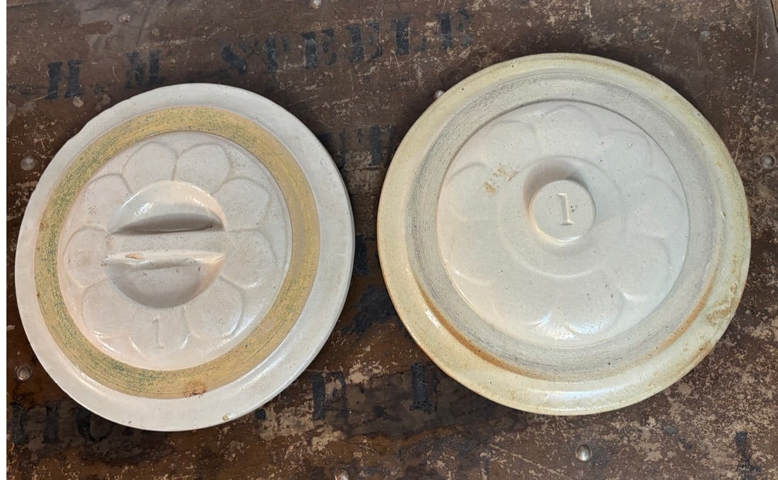 2 Antique Red Wing 1 gallon Stoneware Flower Crock 8" Lids: 2 Antique Red Wing 1 gallon Stoneware Flower Crock 8" Lids. Both a a flower on the top. One has a knob with the number 1 embossed in it. th other has a different inlaid handle with a 1 embossed in the