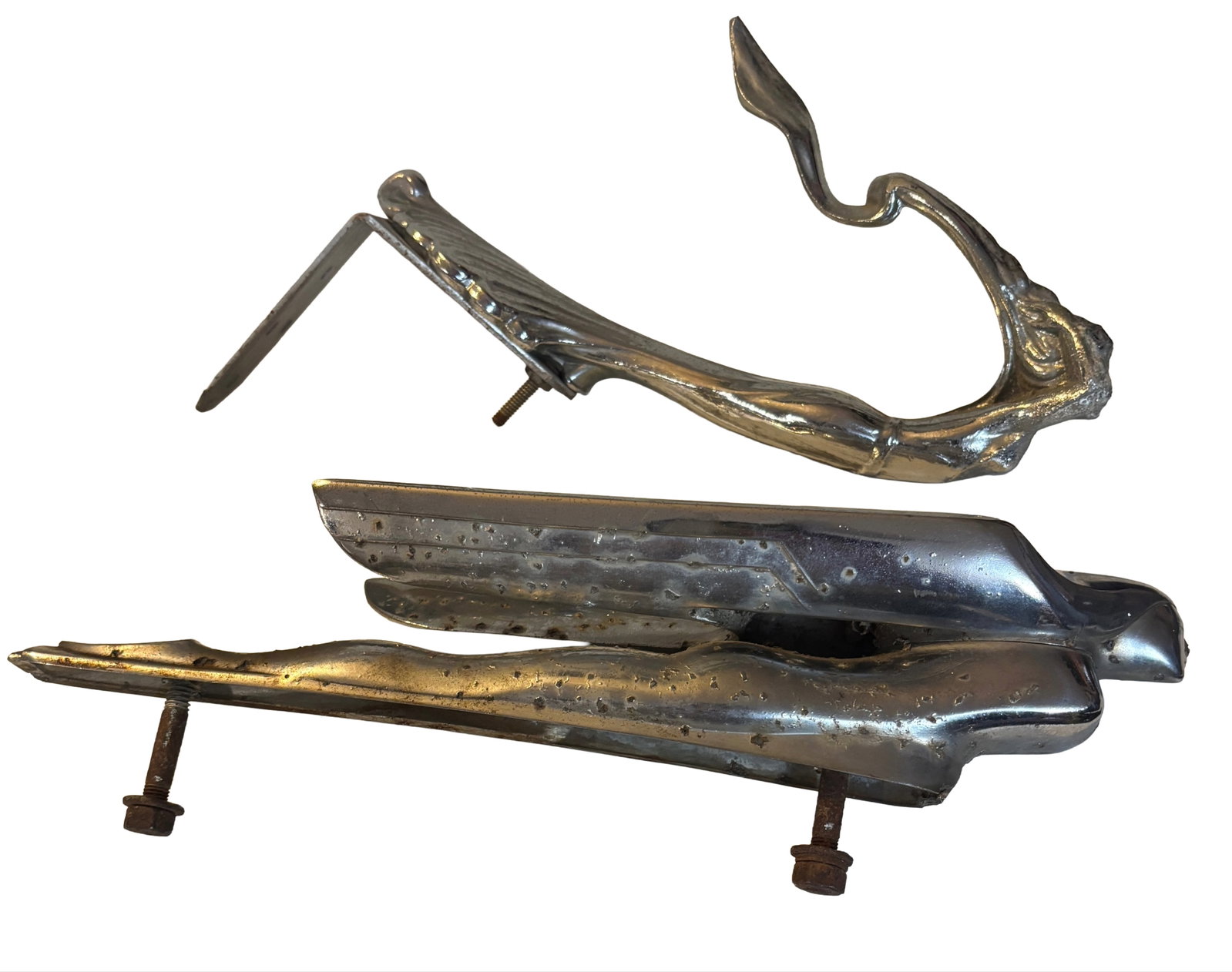 1947 Cadillac: Lot of 2 one money, A 1947 Cadillac "Flying Goddess" hood ornament. & a 1930 Cadilac "Flying Goddess hood ornament. Both have pitting on the Chrome. Both are Chrome plated over metal.