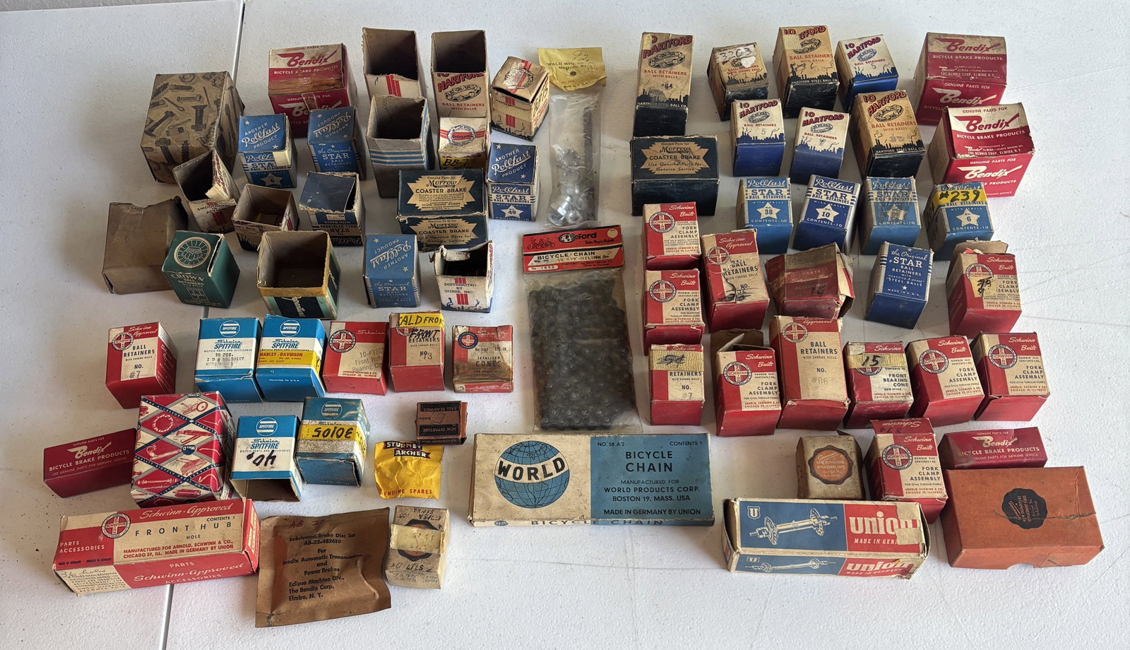 Large Lot Of Bicycle shop Boxes Parts Schwinn Ect: Large Lot of Bicycle Shop Boxes Parts Schwinn Etc. @ sets of NOS chains. Boxes to the right of the chains are in better condition and contain either old parts put back in, nuuts bolts, or a few may