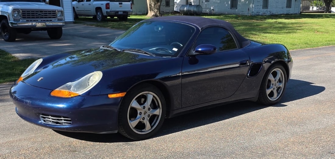 2002 Porsche Boxter Convertible 2.7L: 2002 Porsche Boxter Convertible 2.7L, 5 speed. 2 seater with a power-retractable soft top. Odometer reads 93816. Car runs great, daily driver. Paint and body is good condition, as well as the