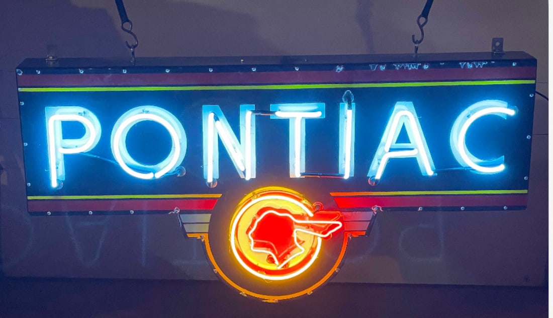 Large 6' Pontiac Porcelain Neon Sign w Flasher: Pontiac Porcelain Neon Sign w Flasher 72" Pontiac Porcelain Real Neon light sign. with a flasher on the Indian head. with adjustable speeds on the flashing. the porcelain face is made from heavy