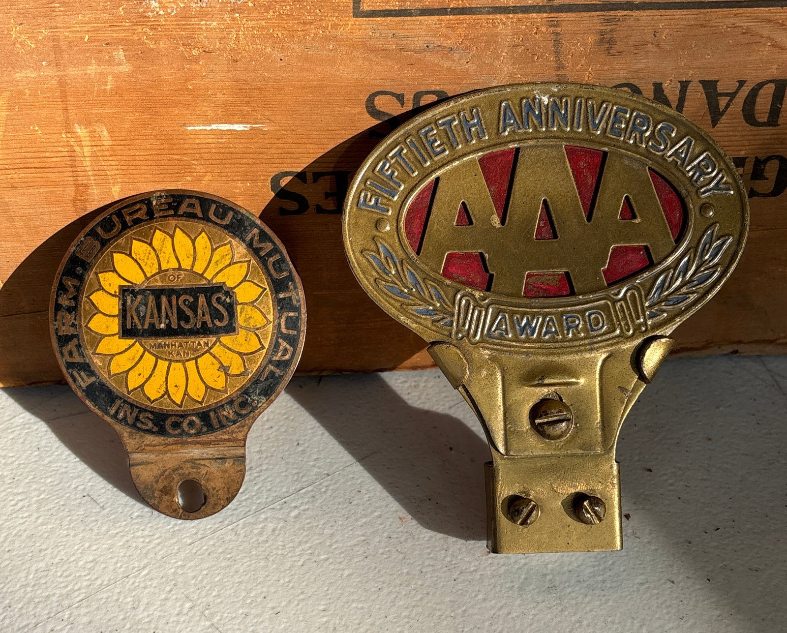 2 License Plate Toppers Kansas & AAA: 2 antique license plate toppers, 1 is a Kansas topper & the other is a AAA. Both in good solid condition. Show some age wear. See pics. Flat rate shipping $15. Or pick up in St. Joseph Mo.