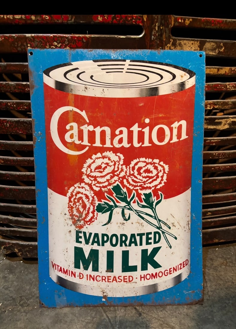 Vintage Carnation Evaporated Milk tin tacker advertising sign: Up for auction is a beautiful, highly collectible original vintage Carnation Evaporated Milk tin tacker advertising sign.Dating back to the mid-20th century, this iconic country store sign features th
