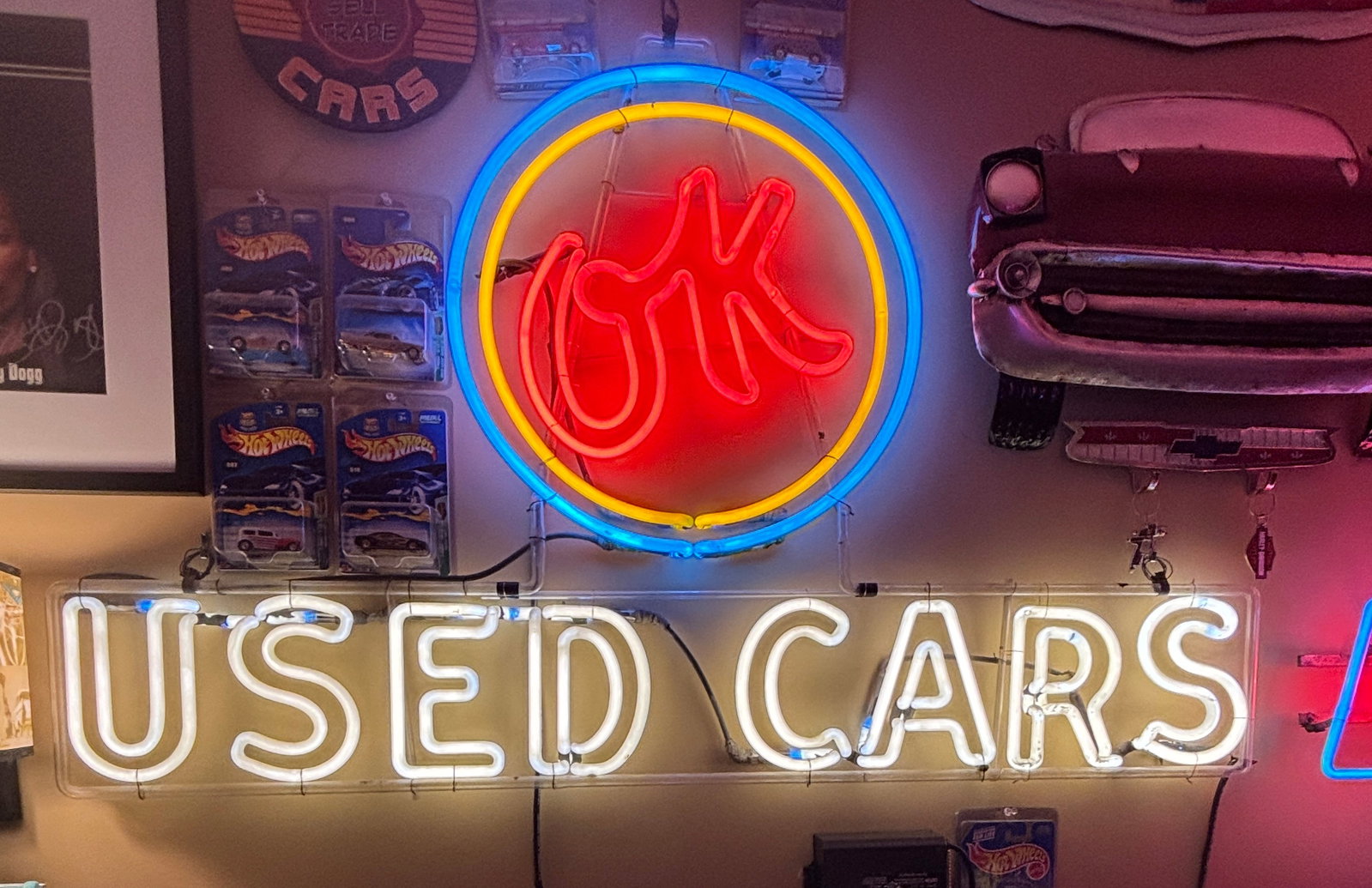 Authentic 1950s Chevrolet "OK Used Cars" neon dealership window sign: A premier highlight for collectors of investment-grade automobilia and petroliana, this authentic 1950s Chevrolet "OK Used Cars" neon dealership sign with original glass skeleton frame. A magnificent 