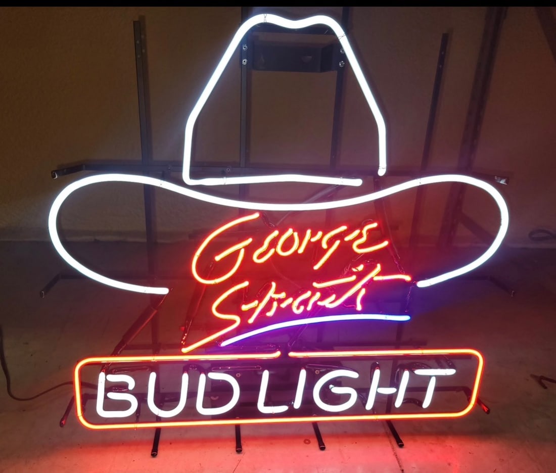 30” Original 1993 George Straight Bud Light Promo Neon Sign: An original commercial-grade Anheuser-Busch promotional neon beer sign issued for country music artist George Strait. Features a distinct neon cowboy hat motif outlined in brilliant white/yellow