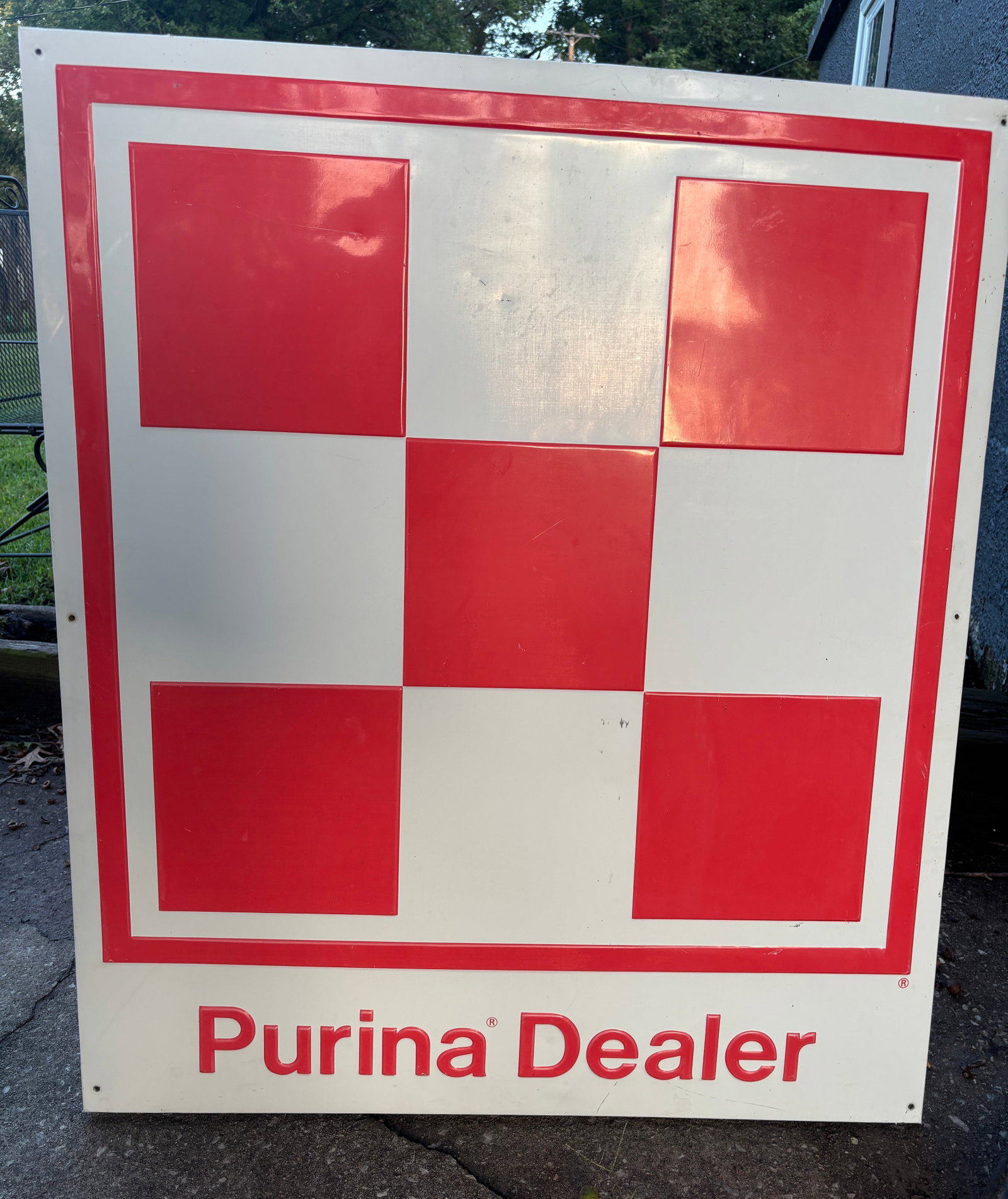 Vintage Metal Purina Dealer Sign Embossed Wood frame back Farm: Original vintage single-sided embossed metal Purina Dealer sign, complete with its rugged, period-correct wooden perimeter frame backing. This iconic piece features the legendary red-and-white Ralston