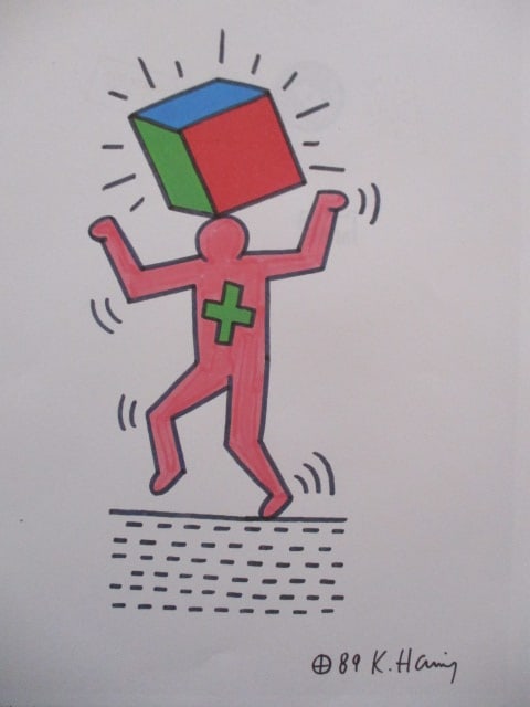 1989 “Block on Head” Watercolor Drawing Attributed to Keith Haring – 8 x 12: 1989 “Block on Head” Watercolor Drawing Attributed to Keith Haring – 8 x 12.Offered is a colorful watercolor drawing depicting a stylized figure with a block positioned on its head, dated ��