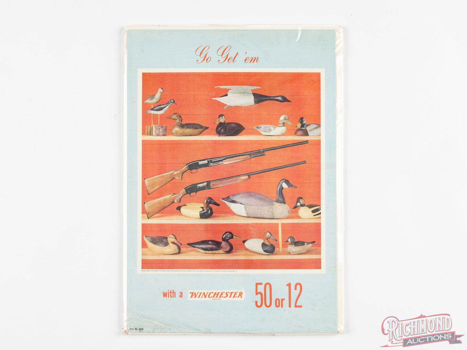 Winchester "Go Get 'em" Model 50 or 12 Shotgun Cardboard Display With Duck Decoys: Winchester "Go Get 'em" model 50 or 12, 15" x 10-1/2" cardboard display. Features a photo of duck decoys from the Joel Barber collection. Shrink-wrapped to a foam board for display, possibly an easel