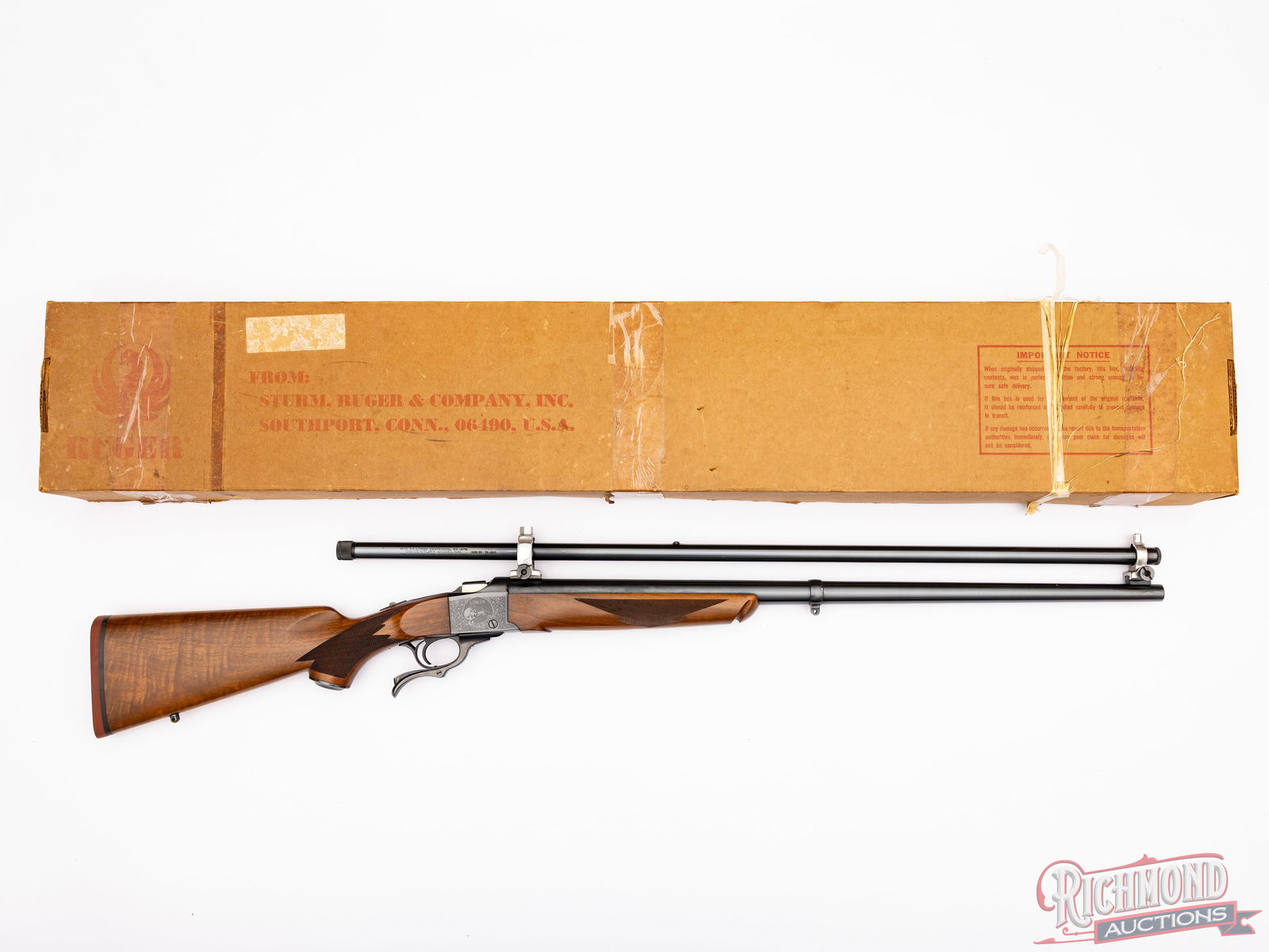 1978 Lyman Centennial Ruger No 1 Falling Block .45-70 GOVT Rifle With Scope in Original Box: Manufactured by Sturm Ruger in coordination of Lyman to commemorate Lyman's Centennial. Ruger model no. 1 rifle features a 28" heavy blued barrel fitted with Unertl scope bases for the Lyman Century