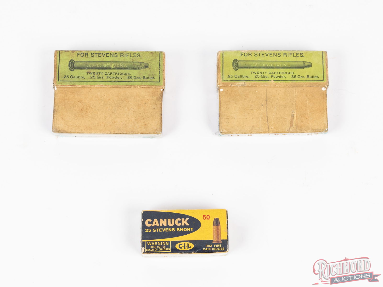 Rare 40 Rounds UMC .25-25 Stevens and 50 Rounds of .25 Stevens Short Ammunition in Vintage Boxes: Rare ammunition in collector boxes! Two, 2-piece boxes of UMC .25-25 Stevens center fire ammunition, 86 grain. Both boxes are factory full. One factory full, 50 round one piece box of CIL Canuck .25