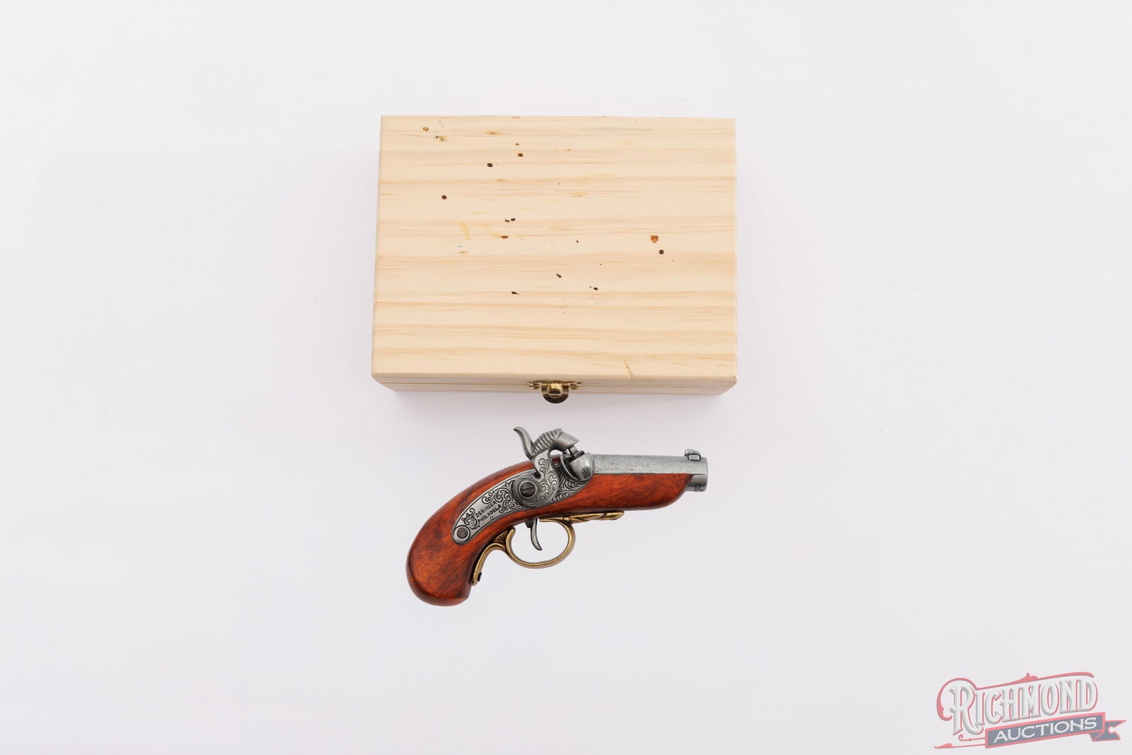 Baby Philadelphia Derringer "Gun That Shot Lincoln" Replica: Manufactured by Denix in Spain, this is a replica of the "gun that shot Lincoln". This non-firing pistol is identical to the Baby Philadelphia Derringer, a single shot percussion cap pistol