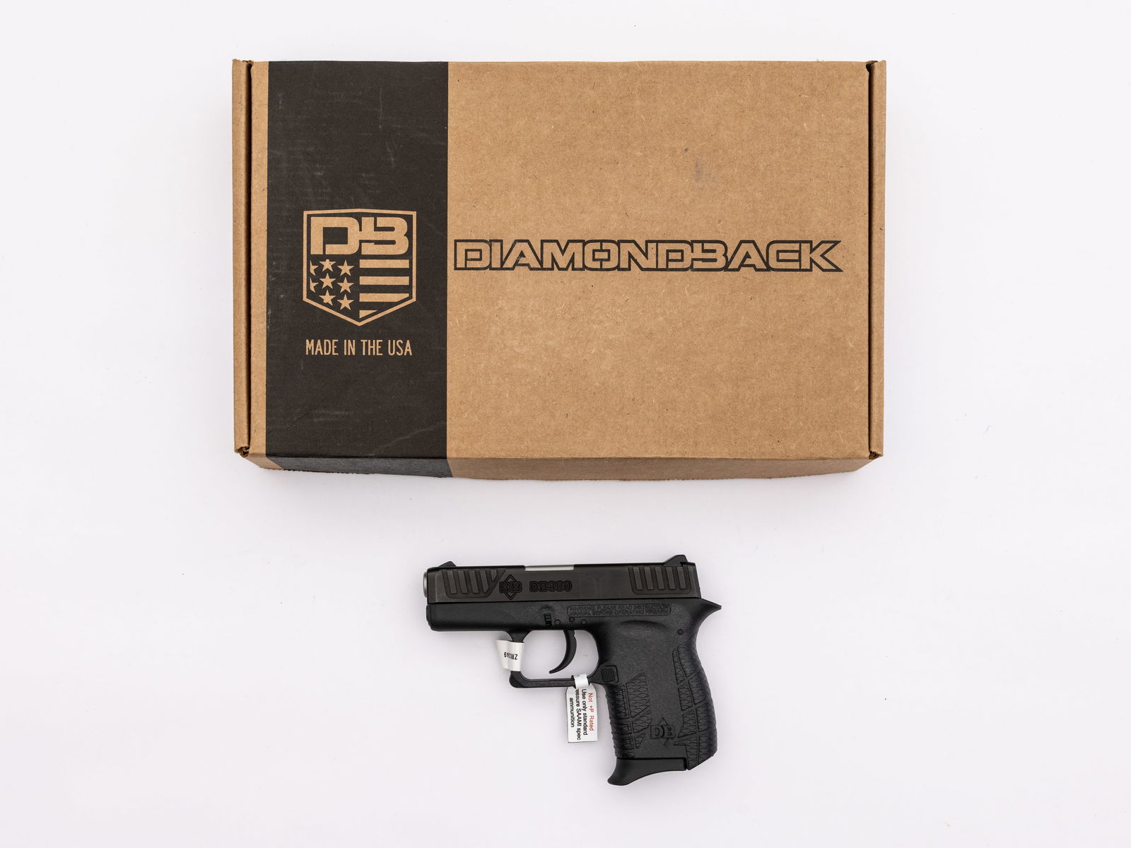 Diamondback Firearms DD380 .380 ACP Semi-Auto Pistol In Original Box: Manufactured by Diamondback Firearms in Florida. This compact lightweight pistol features a 2-3/4" barrel with three white dots, rear adjustable. Black steel slide and black polymer frame. Striker