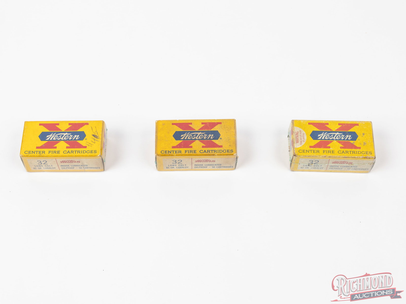 128 Rounds Western X .32 Long Colt Centerfire Ammunition In Vintage Boxes: Three vintage boxes of Western X center fire ammunition. All are .32 Long Colt, 82 grain Lubaloy ammunition. Two boxes are full with 50 rounds each, one has 28 rounds. CALIBER/GA: 32 Long