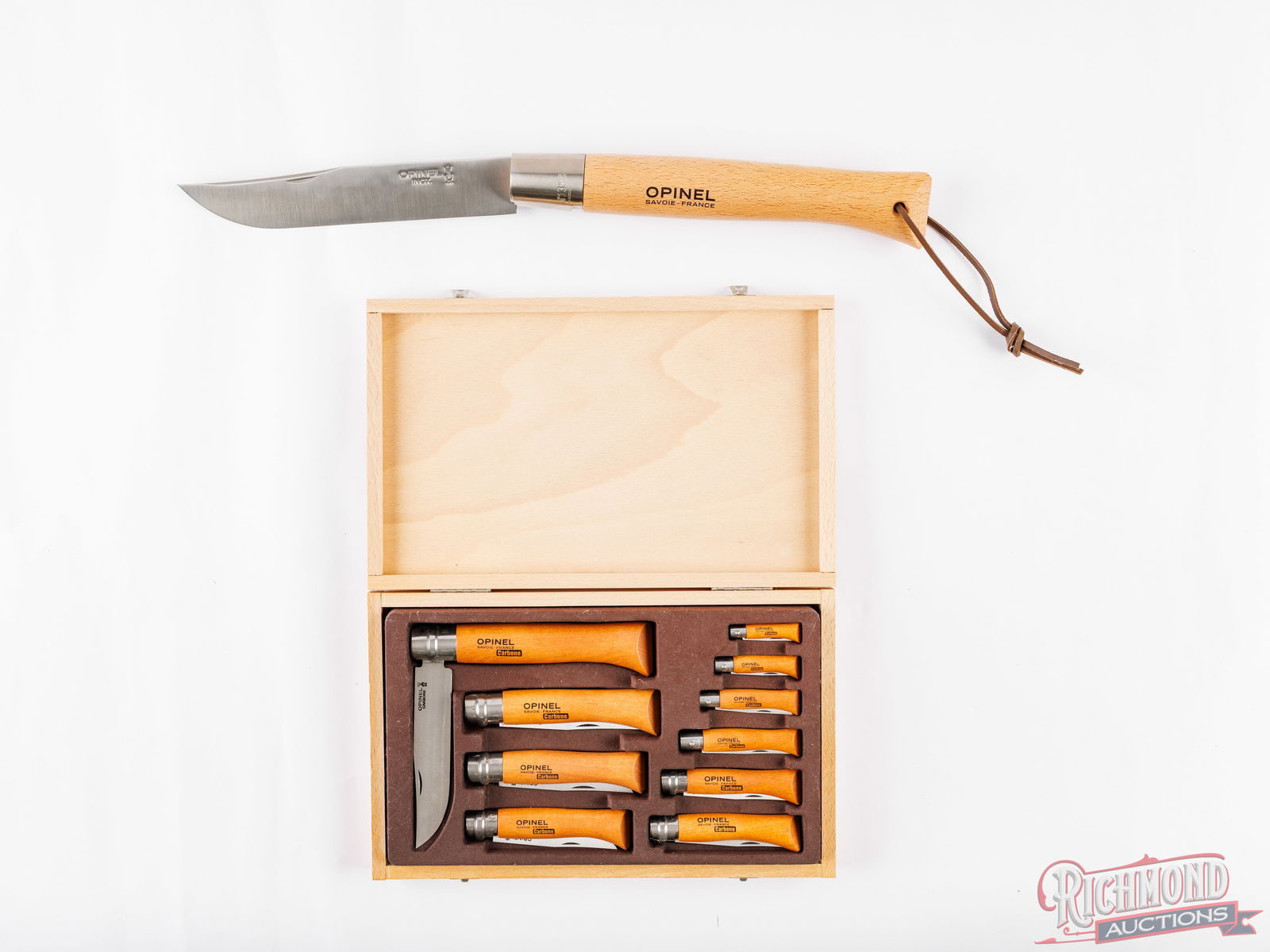 Cased Opinel Carbone Folder Knife Set No. 2 Thru 12 & Giant 13 Inox: Made in France, this popular Opinel folding knife set features 10 carbon steel folding knives ranging from the tiny No.02 to the large No.12. This set comes in a wooden case, ideal for storing and/or