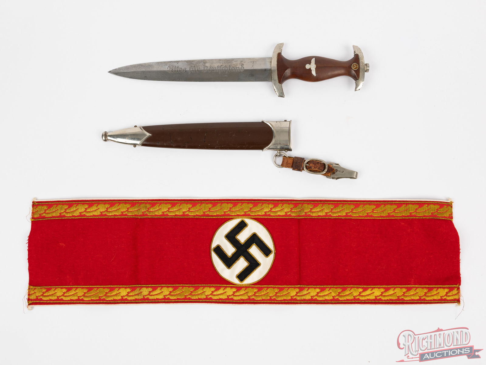 1941 JA Henckels RZM WWII SA German Dagger With Sheath And Armband: This is an excellent example of an RZM-produced dagger, manufactured by J.A. Henckels in Solingen Germany. Dated 1941 with the RZM code "M7/10". The blade is in good overall condition with some light