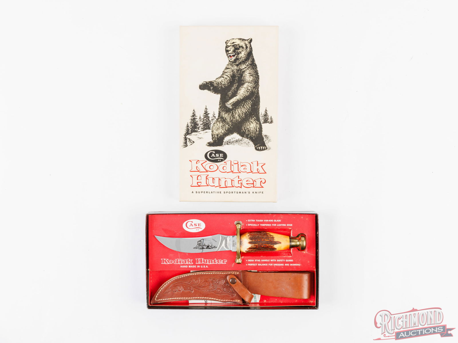Case XX Kodiak Hunter Sportsman's Knife in the Original Box: This vintage Case XX features a 5-1/2" trailing point blade with the Kodiak bear etched in the blade. Double brass hilt, stag handle and brass cap. Measures 10-1/2" overall. Comes in the original box