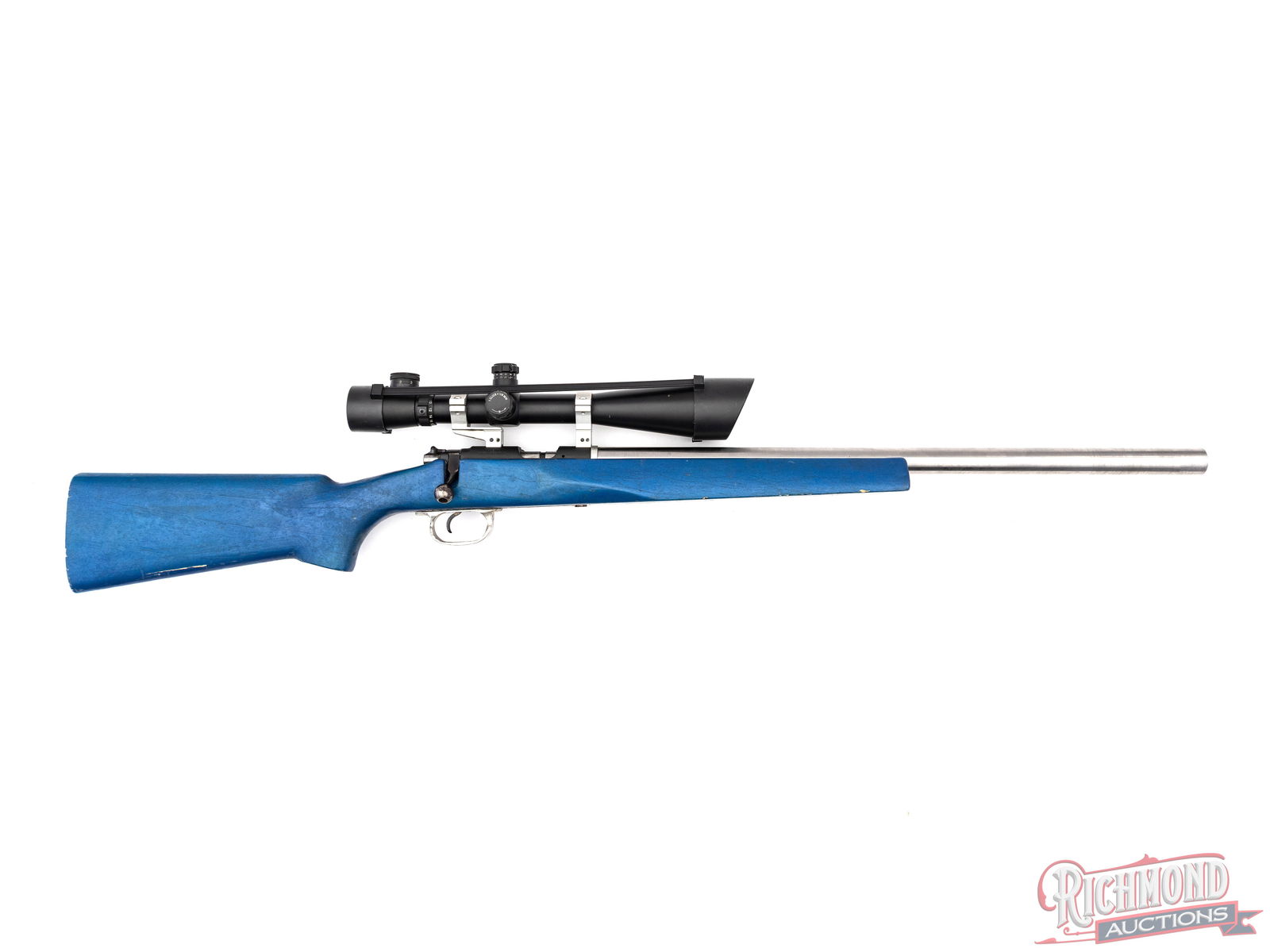 Custom CZ 452-2E ZKM Bolt Action .22 LR Rifle Stainless Bull Barrel & Scope: Action manufactured by CZ in the Czech Republic. Features a custom 24" sightless, heavy stainless bull barrel. Equipped with a NC Star 6-24x50 Mil-Dot scope on aluminum scope rings. CZ action with