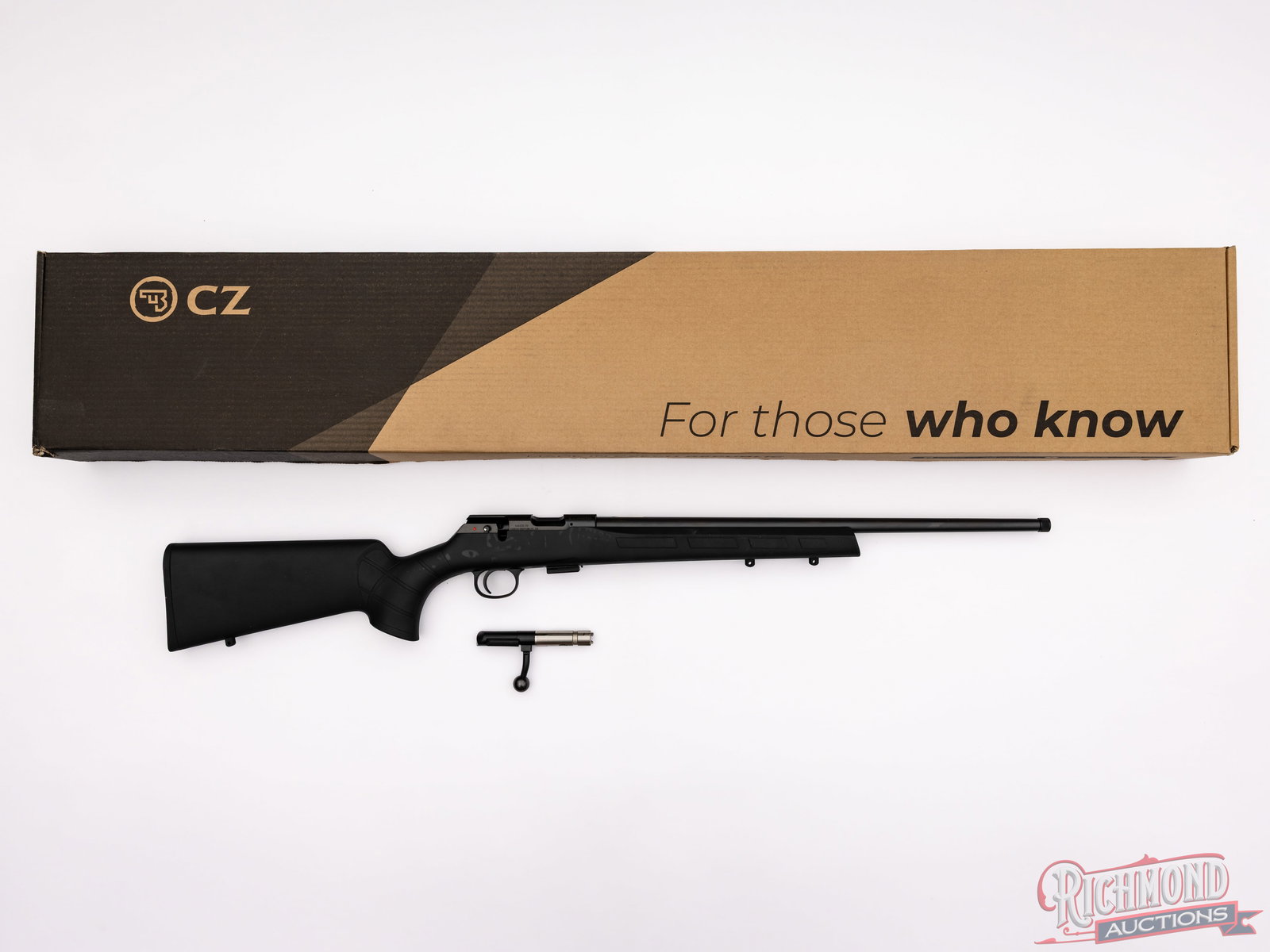 CZ Model 457 Bolt Action Rifle With Threaded Barrel .22 LR: CZ Model 457 bolt action rifle with synthetic black stock. It features a 20 " threaded barrel (1/2 x 28) and a 5 round magazine. A push to fire safety is located above the trigger and an 11" dovetail