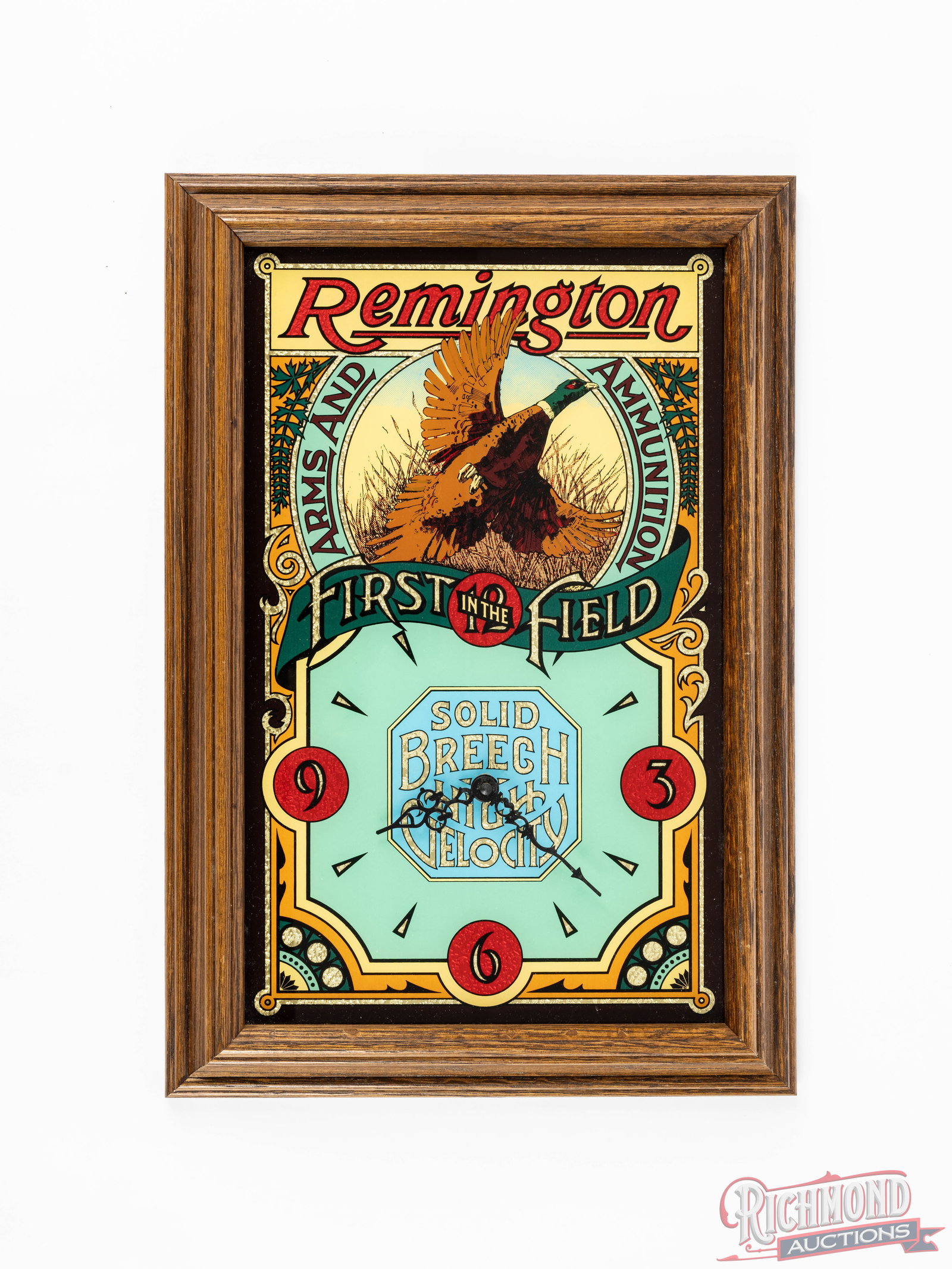 Remington Arms & Ammunition "First In The Field" Glass Face Framed Clock (1 of 2)