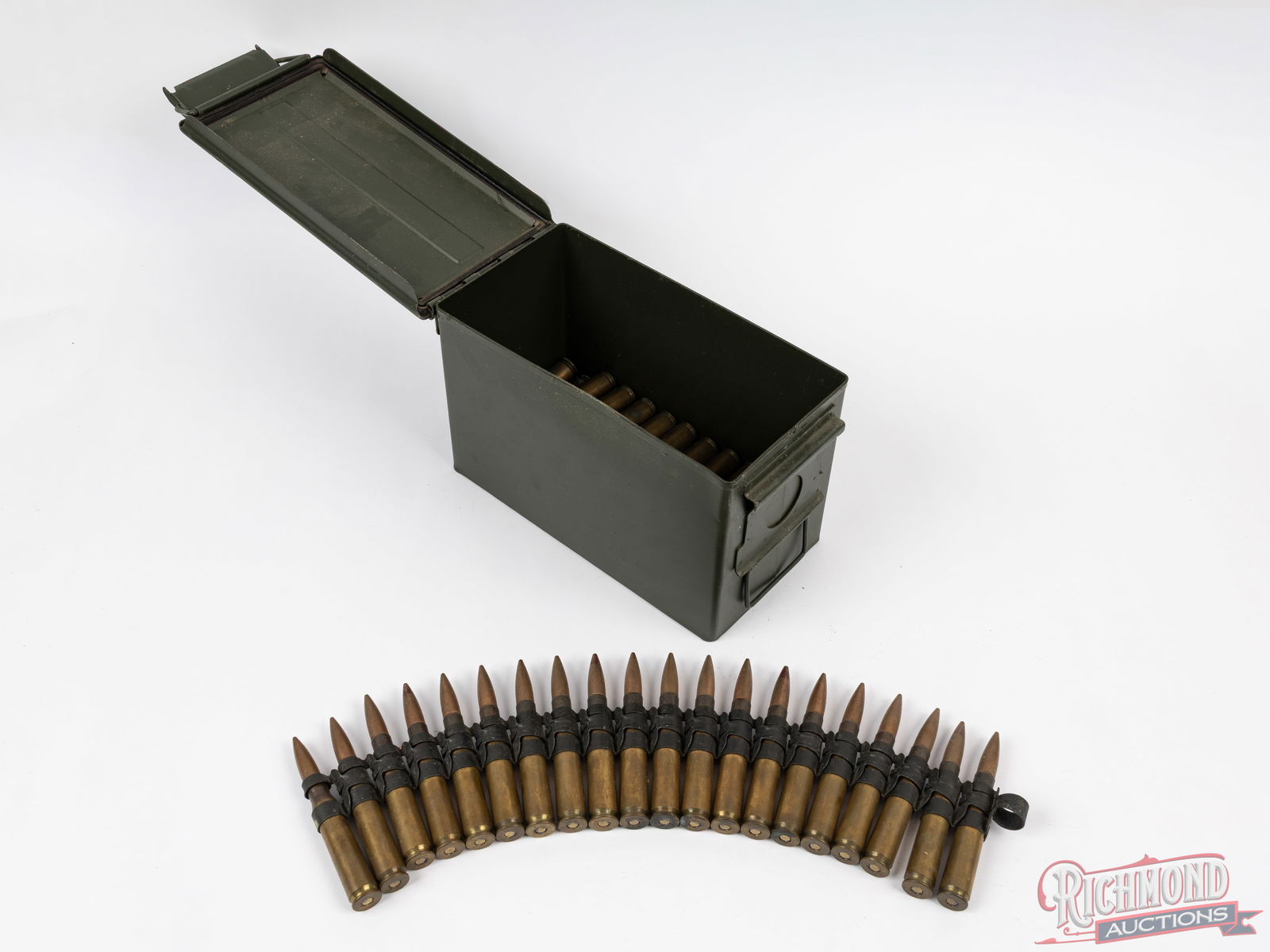 42 Rounds Of 50 BMG Linked Ammunition Ball and Tracer Rounds With Metal Storage: In this steel ammo can is 42 rounds of TW52 headstamped 50 BMG Cartridges liked together. TW52 indicates it was produces at the Twin Cities Ordinance plant in 1952. In the links is 36 Ball cartridges