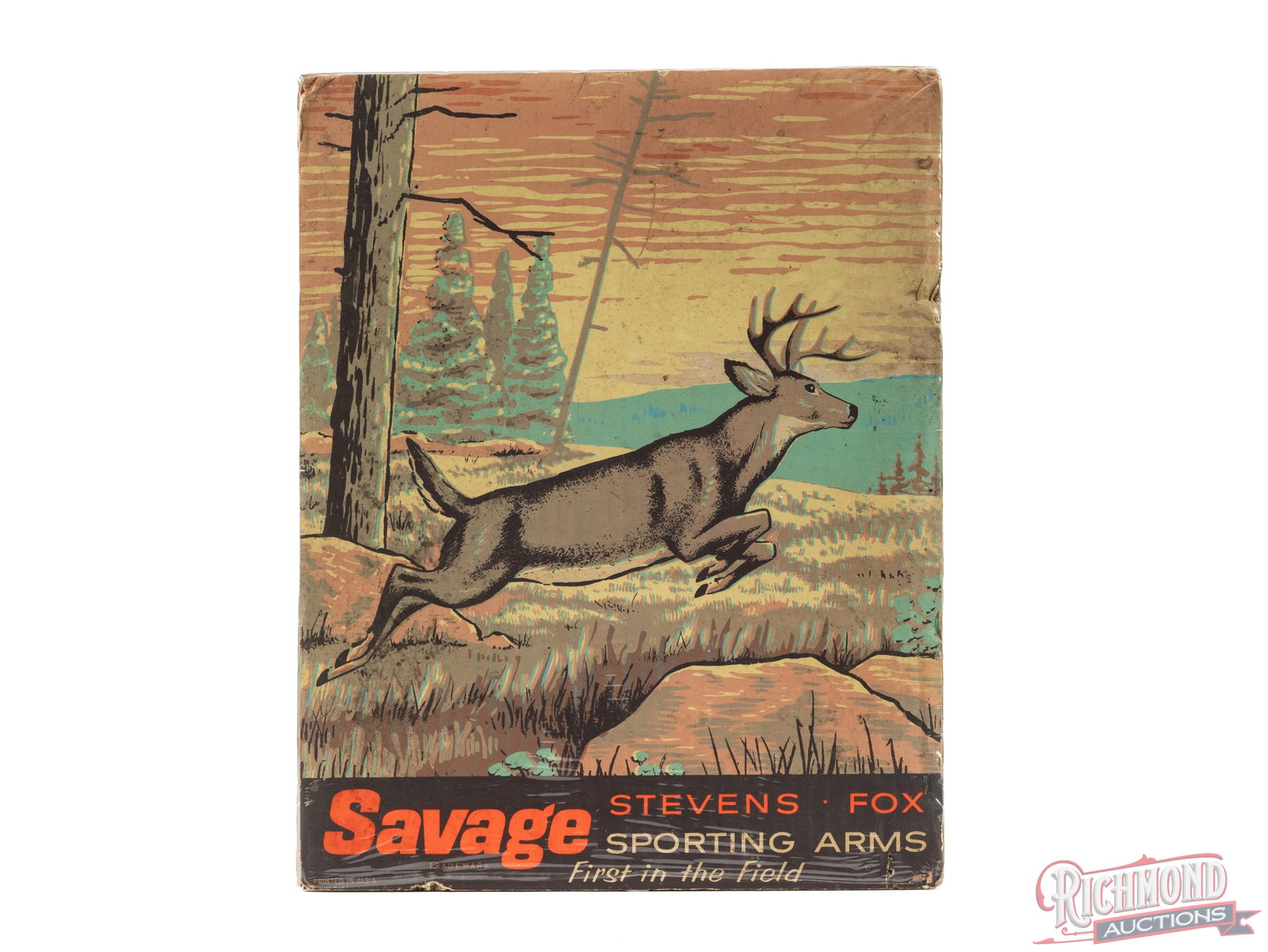 Savage Sporting Arms "First In The Field" Countertop Sign: This cardboard sign was made for Savage Sporting Arms and shows a running buck with the line "First In the Field". It measures 11"x 14", has the carboard easel stand on the back, and is shrink
