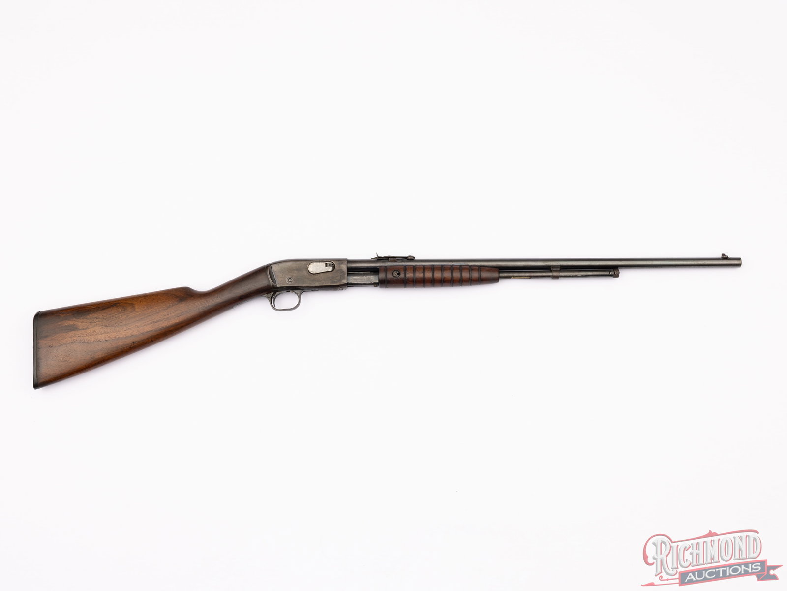 Remington Model 12A Pump / Slide Action Rifle in .22 Short / Long / LR: Manufactured by Remington Arms between 1909 and 1936. Features a 22" re-blued barrel with rear elevation adjustable notch and dovetailed front blade. Blued action with crossbolt safety and 2/3 barrel