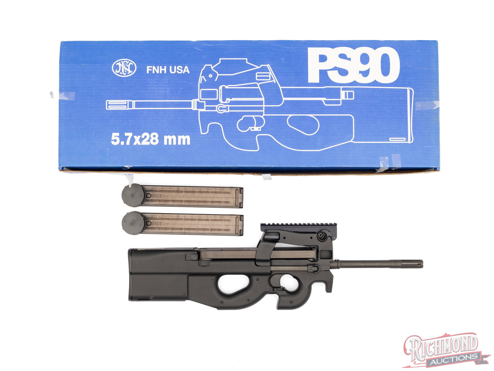 FN America PS90 Bullpup 5.7x28mm Semi-Automatic Rifle In Original Box: Manufactured by FNH in Belgium for FN USA. This bullpup rifle features a 16.04" mil-spec barrel with a 2-1/4" muzzle brake. Chambered for the 5.7x28mm cartridges. Semi-automatic action using a