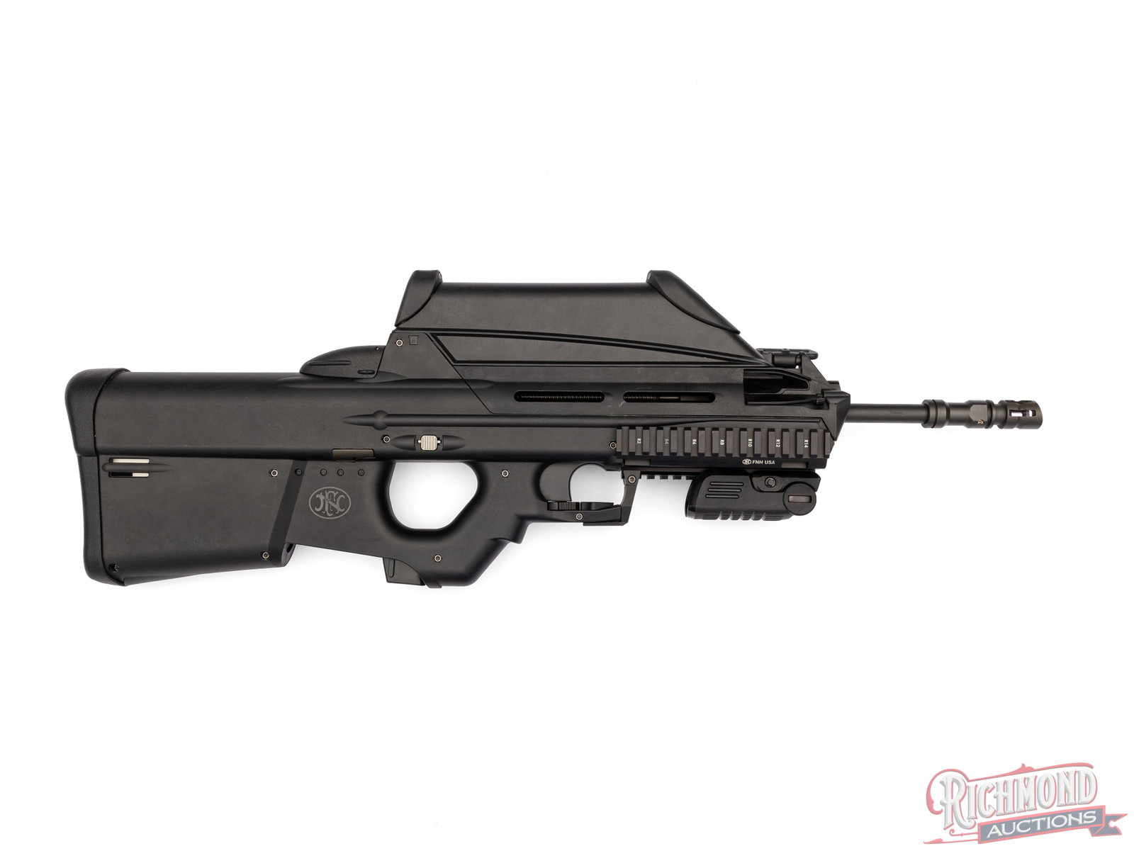 FN Herstal FS2000 Semi-Automatic Bullpup Rifle 5.56 NATO: This rifle was made by FN Herstal in Belgium and chambered in 5.56 NATO. It features an approximate 17" barrel with integrated optic sight and left side charging handle It is fitted with accessory