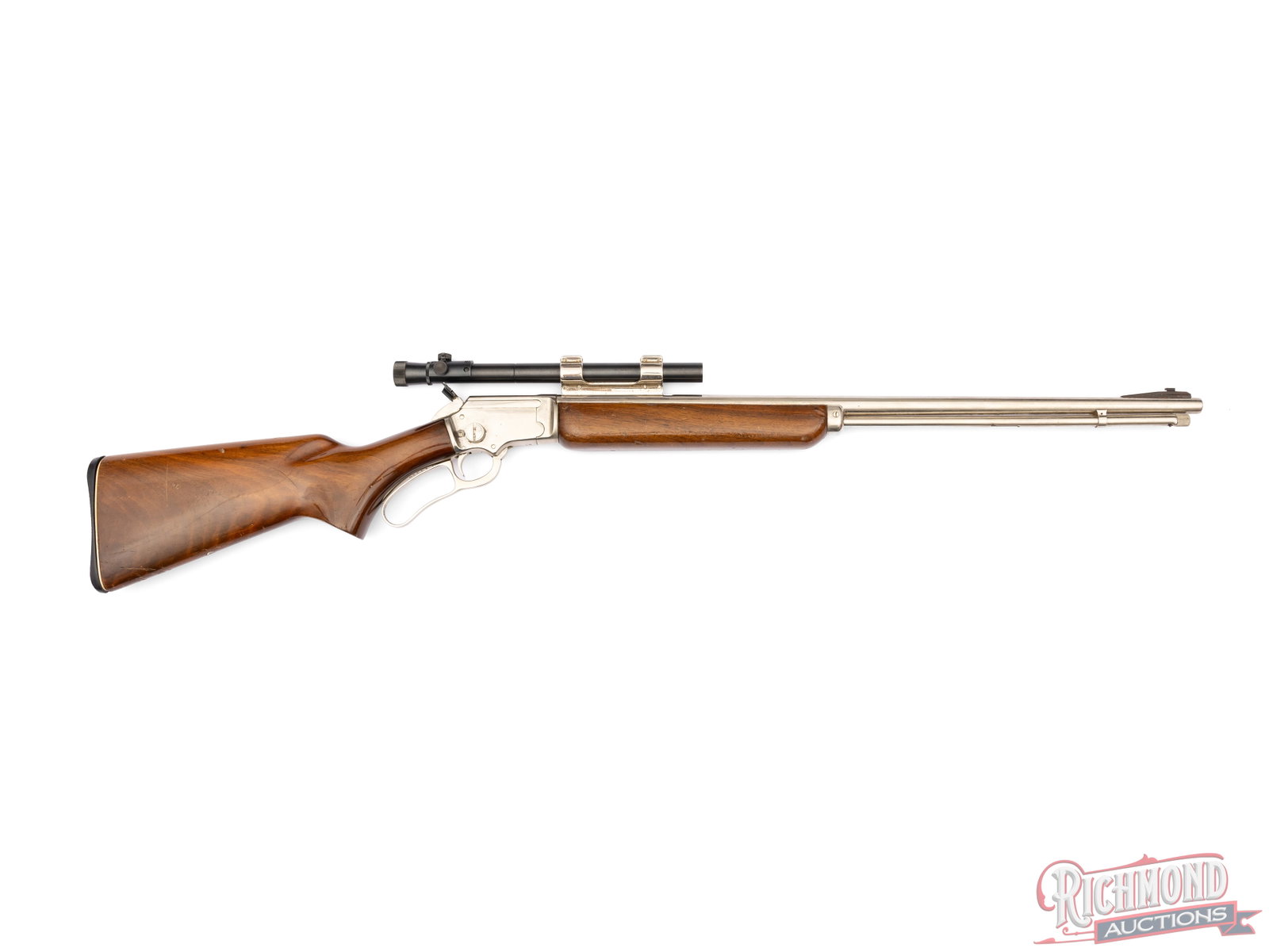 1952 Marlin Firearms Model 39A Lever Action .22 S/L/LR Rifle Nickel Finish With Scope: Manufactured by Marlin Firearms Co circa 1952. Features a 24" round barrel with ramped front sight. Full barrel length magazine tube chambered for .22 short, long, or LR. Missing rear sight but