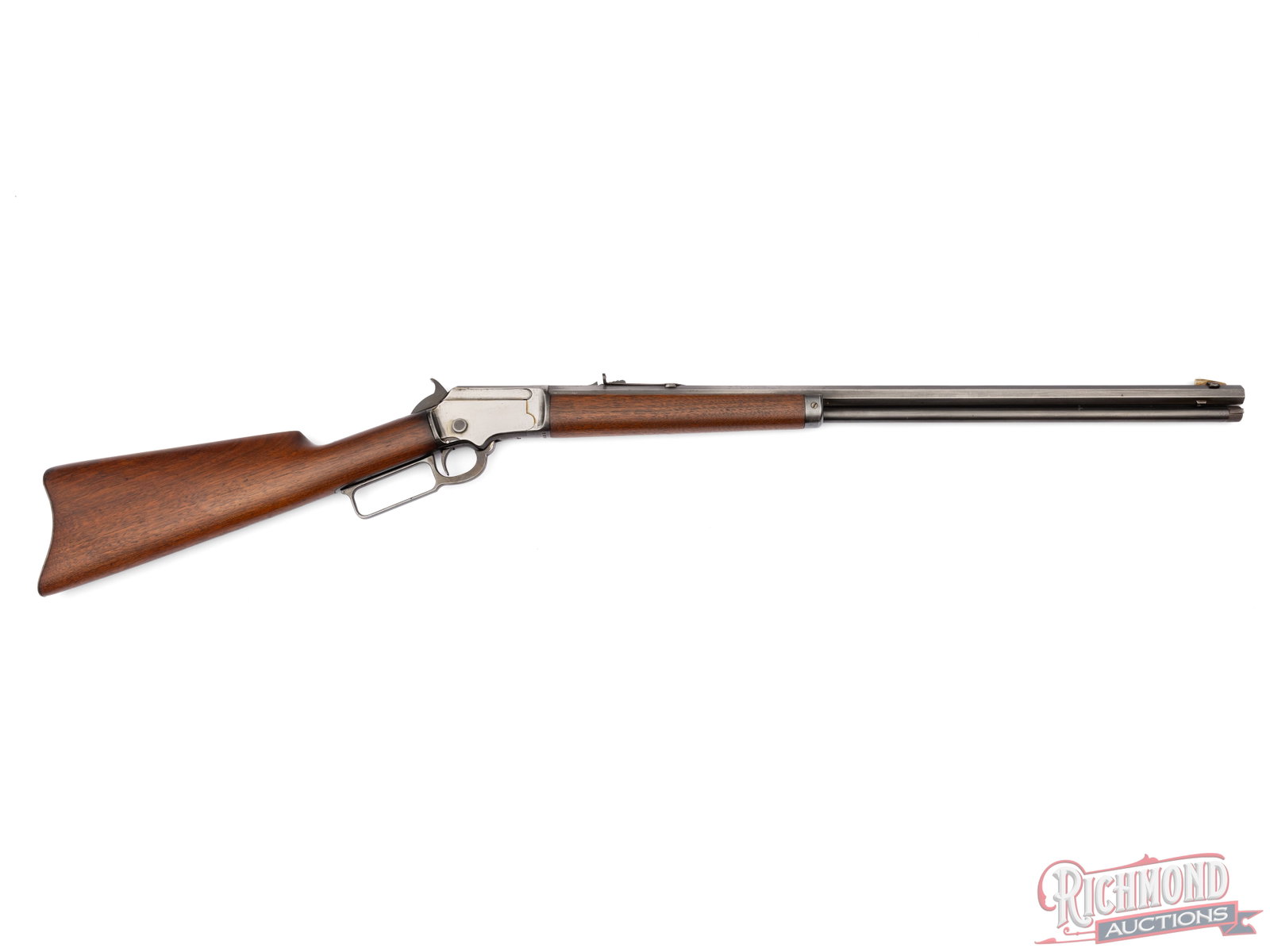 Marlin Firearms Model 92 Octagon Lever Action Rifle in .32 Rimfire: Manufactured by Marlin Firearms Co circa 1910. Features a 24" octagon barrel with the Marlin two-line address. Rear semi-buckhorn and blade front sight. Full barrel length magazine tube holds up to