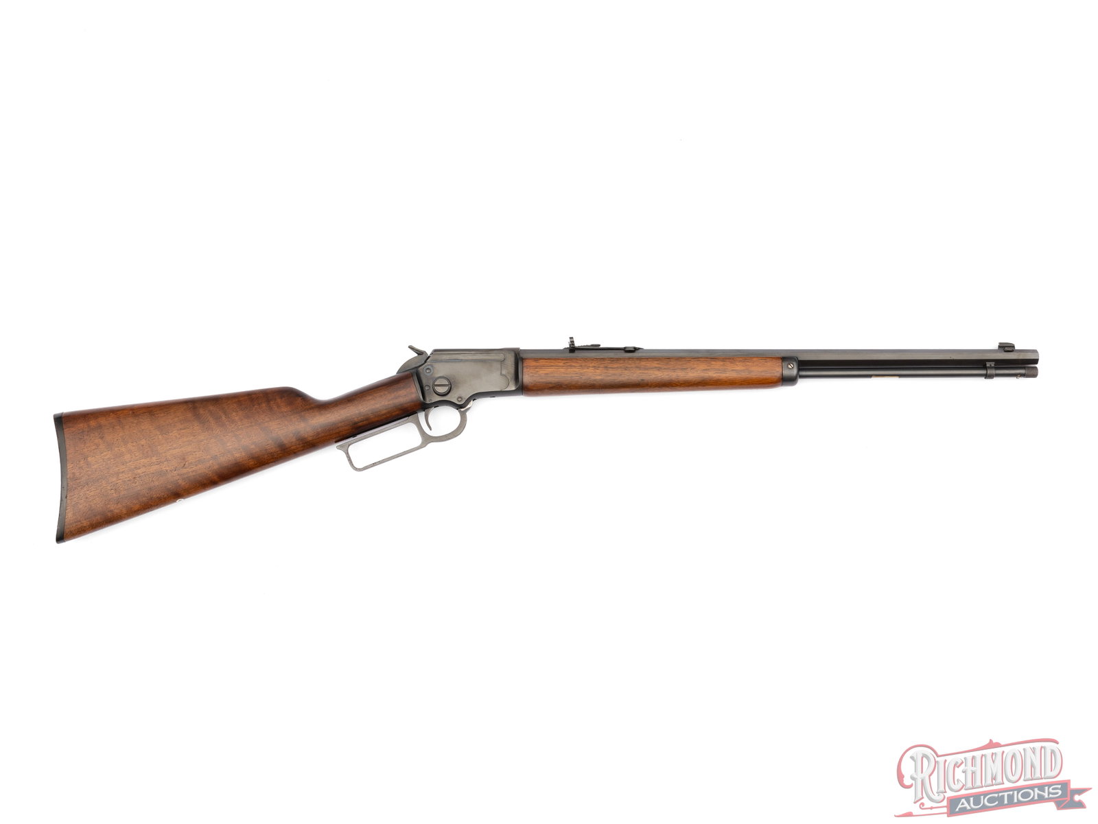 Scarce Marlin Firearms Model 39M Octagon .22 S/L/LR Lever Action Rifle: Manufactured by The Marlin Firearms Co in 1973, the only year this model was produced. Features a 20" blued octagon barrel with rear elevation adjustable notch and blade front sight. Full barrel