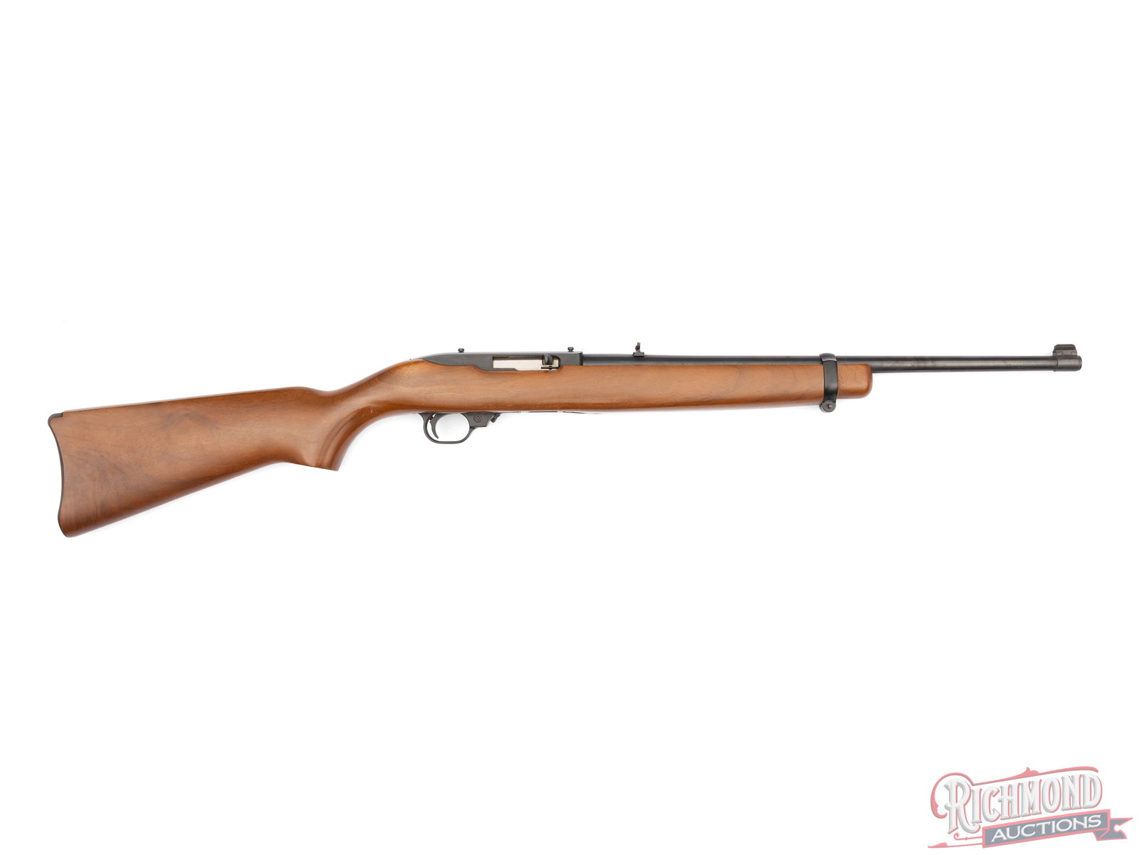 1979 Ruger Model 10/22 Carbine .22 LR Semi-Automatic Rifle: Manufactured by Ruger in 1979. Features an 18" blued tapered barrel with rear flip-up adjustable notch and blade front (missing bead). Blued semi-automatic receiver, drilled and tapped, crossbolt safe