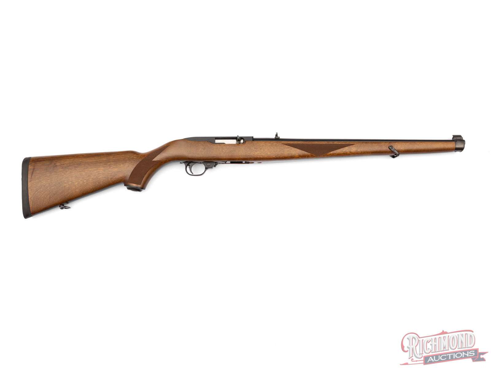 Ruger 10/22 Mannlicher Carbine .22 LR Semi-Auto Rifle: Manufactured by Ruger in 1996. This rifle features an 18" blued barrel with rear flip-up notch sight and blade front with brass bead. Matte blue receiver, drilled and tapped for scope mount. Semi auto