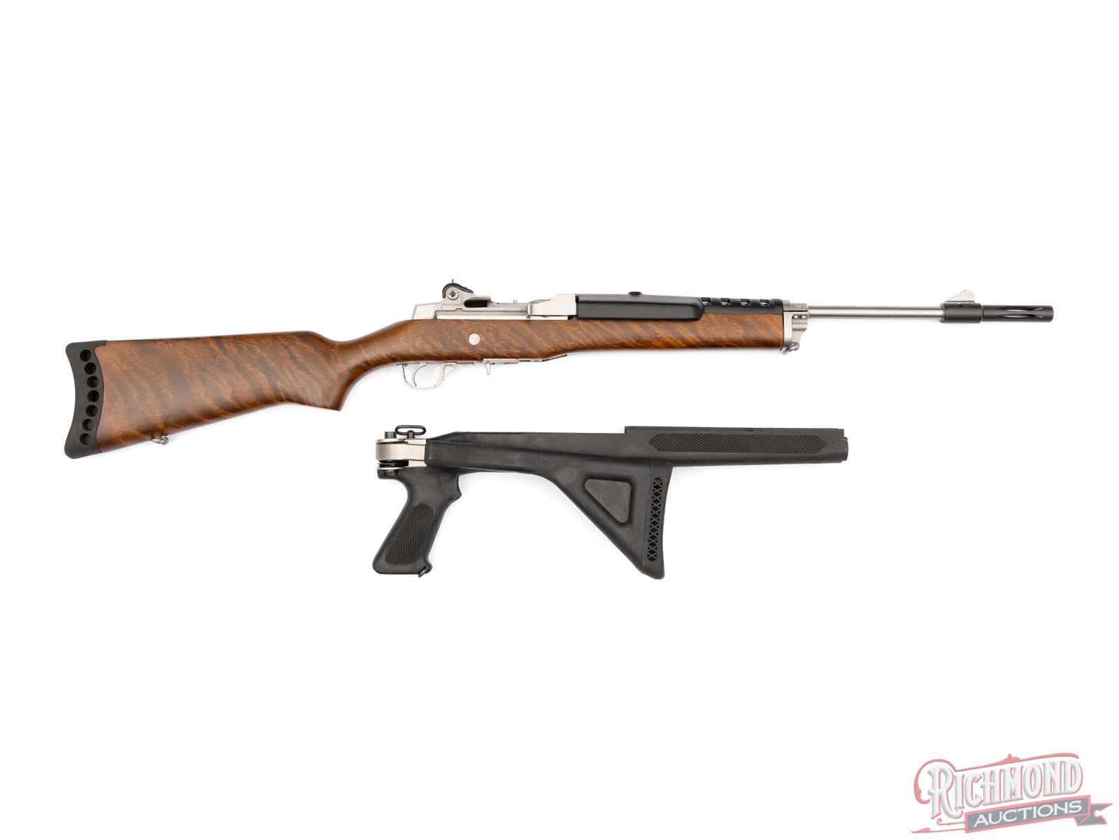 Ruger Mini 14 Ranch Semi Auto Rifle With Extra Collapsible Stock .223 Caliber: This semi auto rifle was manufactured by Sturm Ruger & Co. in Southport Conn. It features an 18 1/2" stainless barrel with an orange ramp front sight and adjustable rear sight. The receiver has a