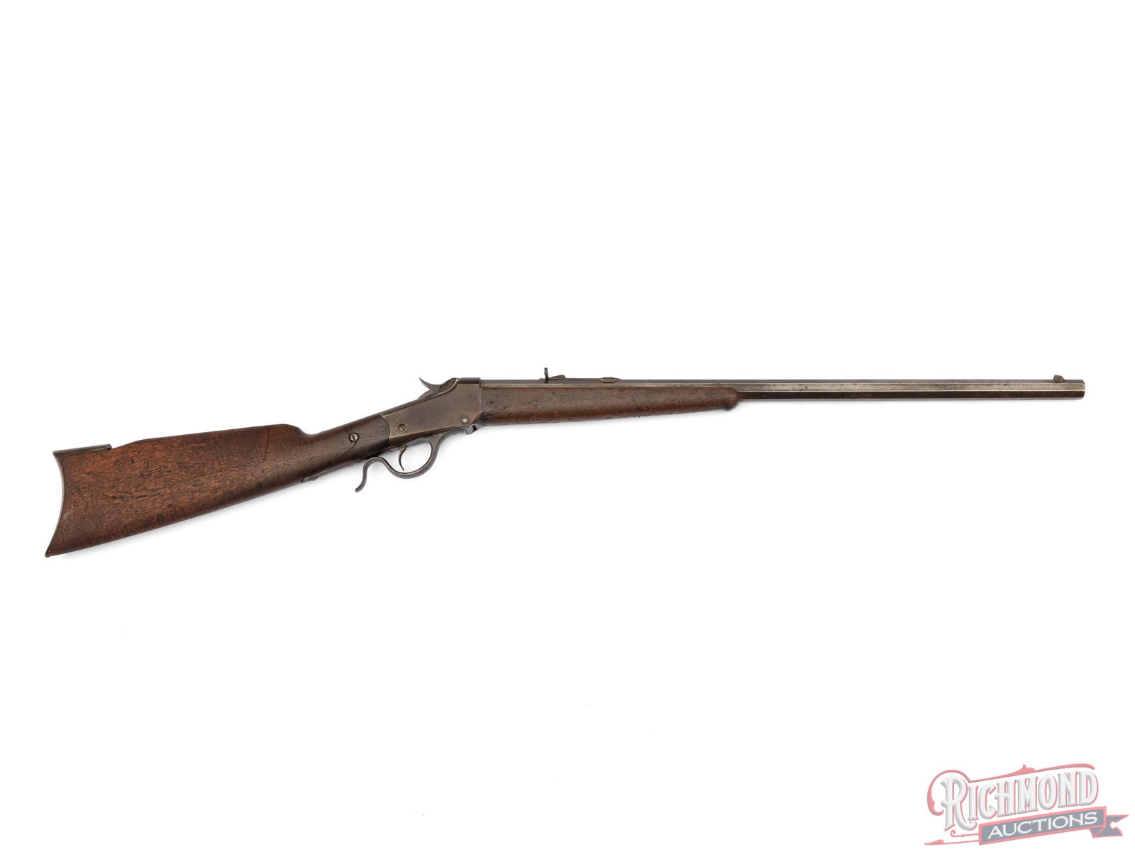 Antique Winchester Model 1885 Low Wall Single Shot Rifle .22 Short: This model 1885 rifle was made by Winchester in 1890 and is chambered in .22 Short. It features a 24" Octagon barrel with a dovetail blade front sight and buckhorn rear sight. Barrel is marked with