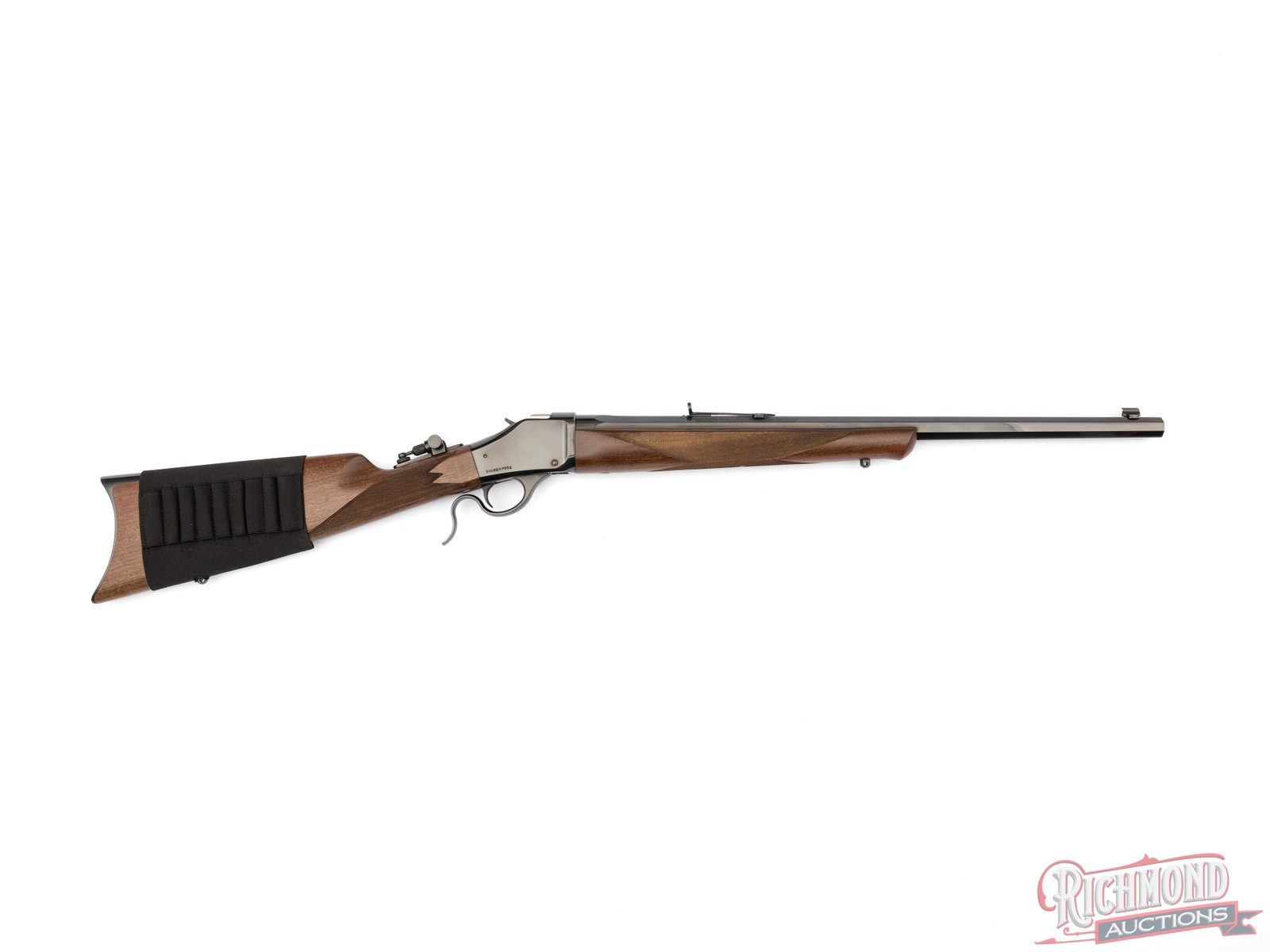 Winchester 1885 High Wall Limited Series Short Rifle Single Shot .45/70 GOVT: Manufactured by Miroku for Winchester. Features a 22" blued octagon barrel with rear adjustable semi-buckhorn and dovetailed blade with brass bead front sight. Also has a tang mounted folding peep