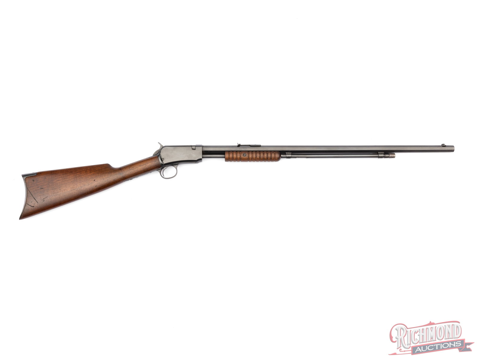 Winchester Model 90 Takedown Pump Action Rifle With Octagon Barrel .22 Short: This Model 90 rifle was made circa 1920 By the Winchester Repeating Arms Co. It features a dovetail blade style front sight and notch rear sight on a 24" octagon barrel with a tube magazine fitted
